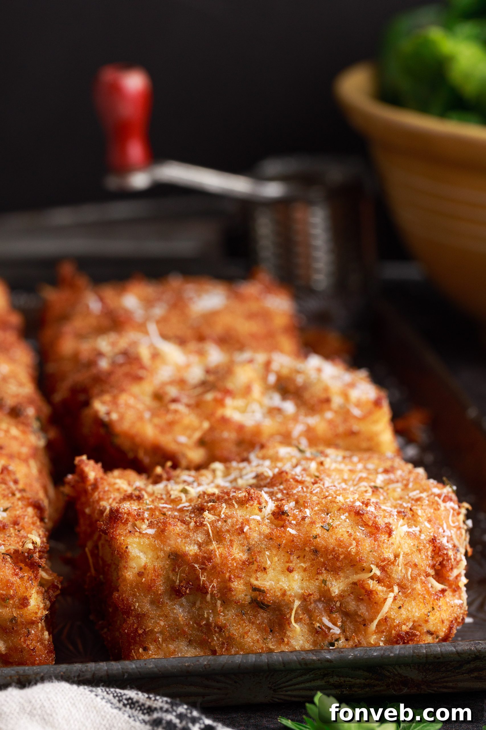 Golden Lasagna Crunch 7 Deep fried lasagna pieces draining on paper towels