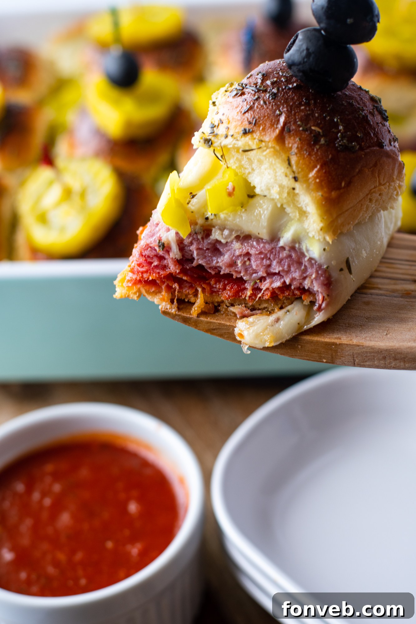 Little Italian Bites 9 Close-up of Italian Slider with melted cheese and deli meat