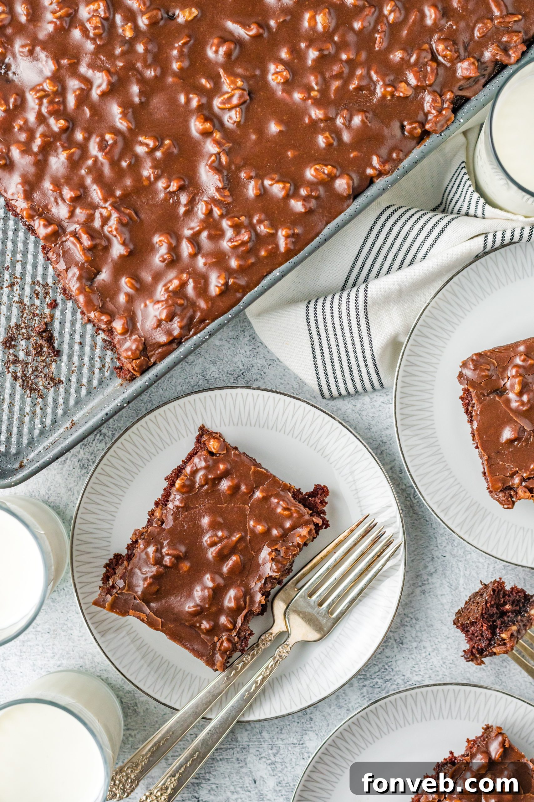 Texas Sheet Cake sliced on plates 