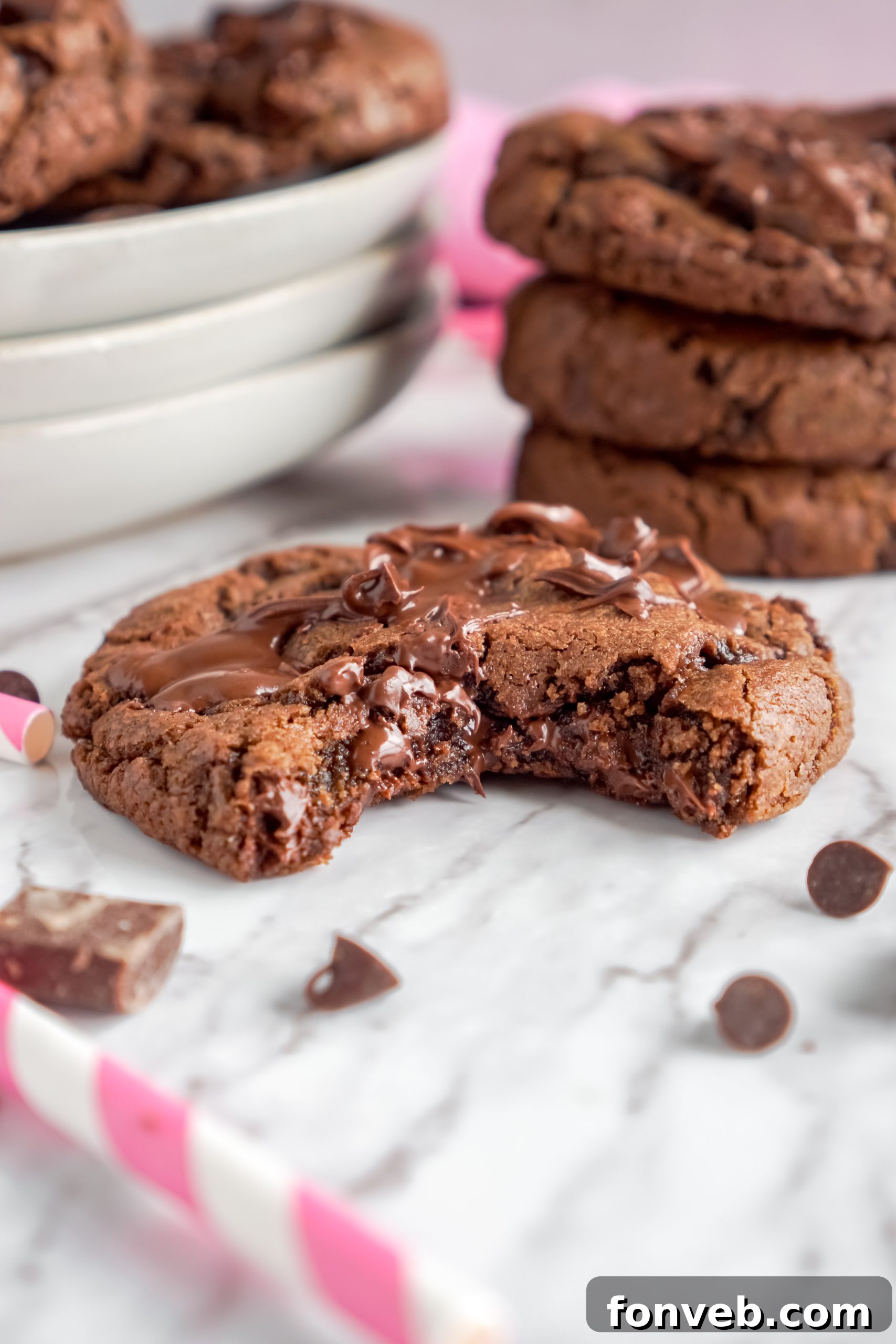 Triple chocolate cookie dough balls on a baking sheet