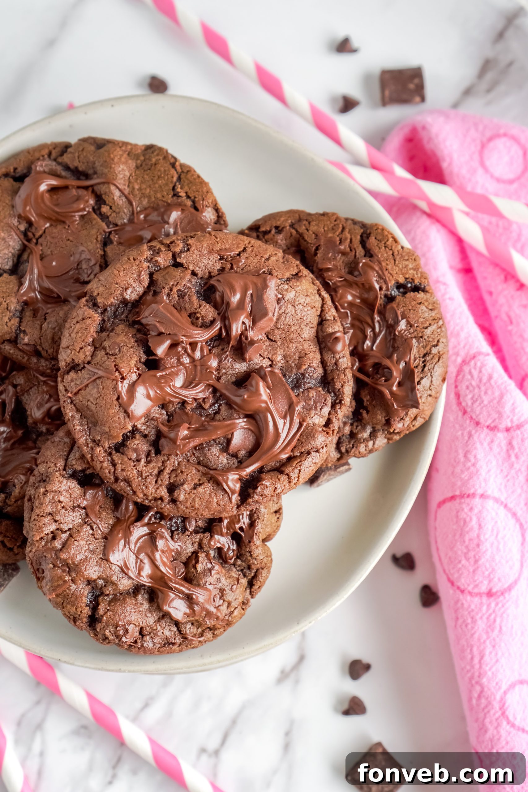 Close-up of a warm, gooey triple chocolate cookie