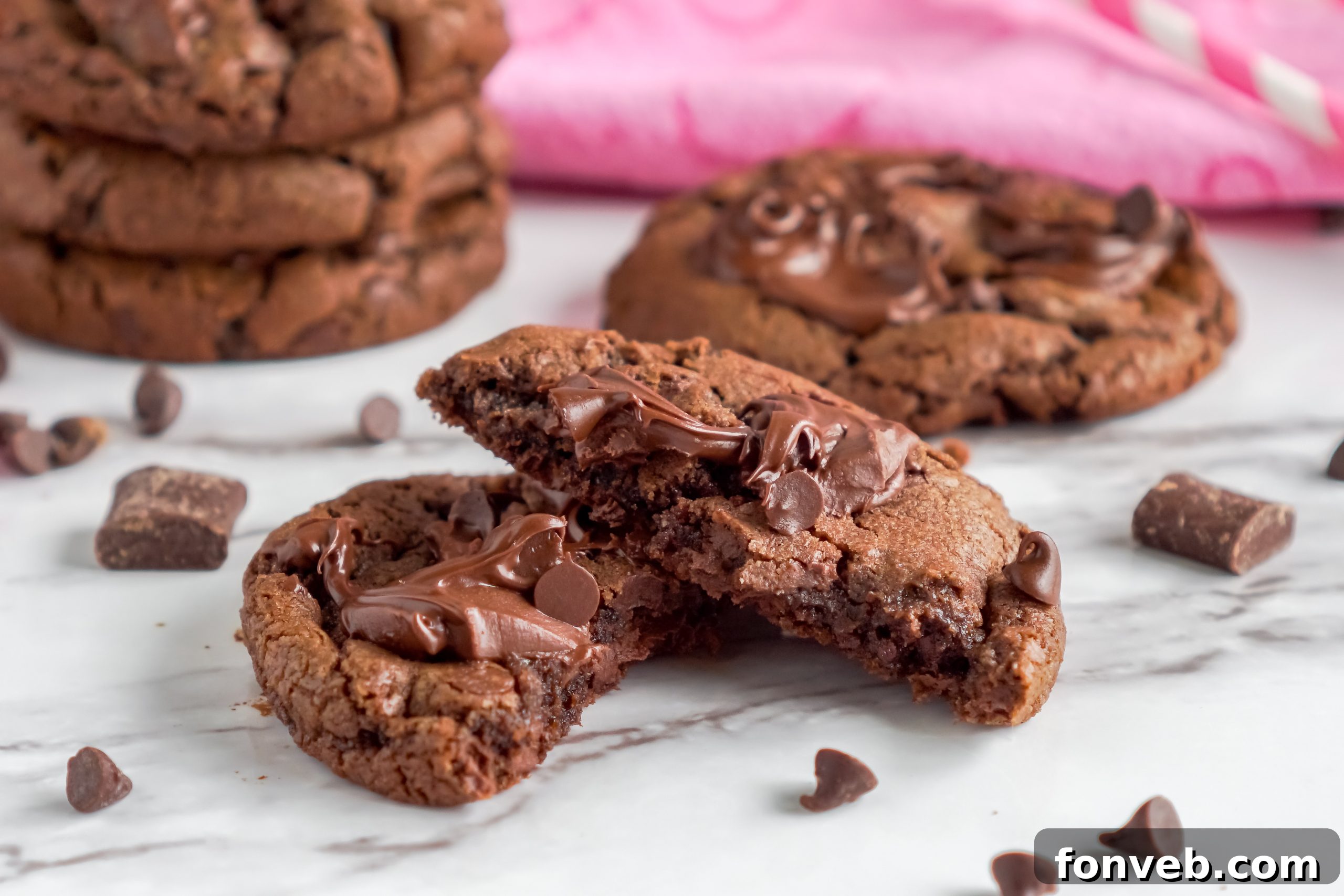 Triple chocolate cookies cooling on a wire rack
