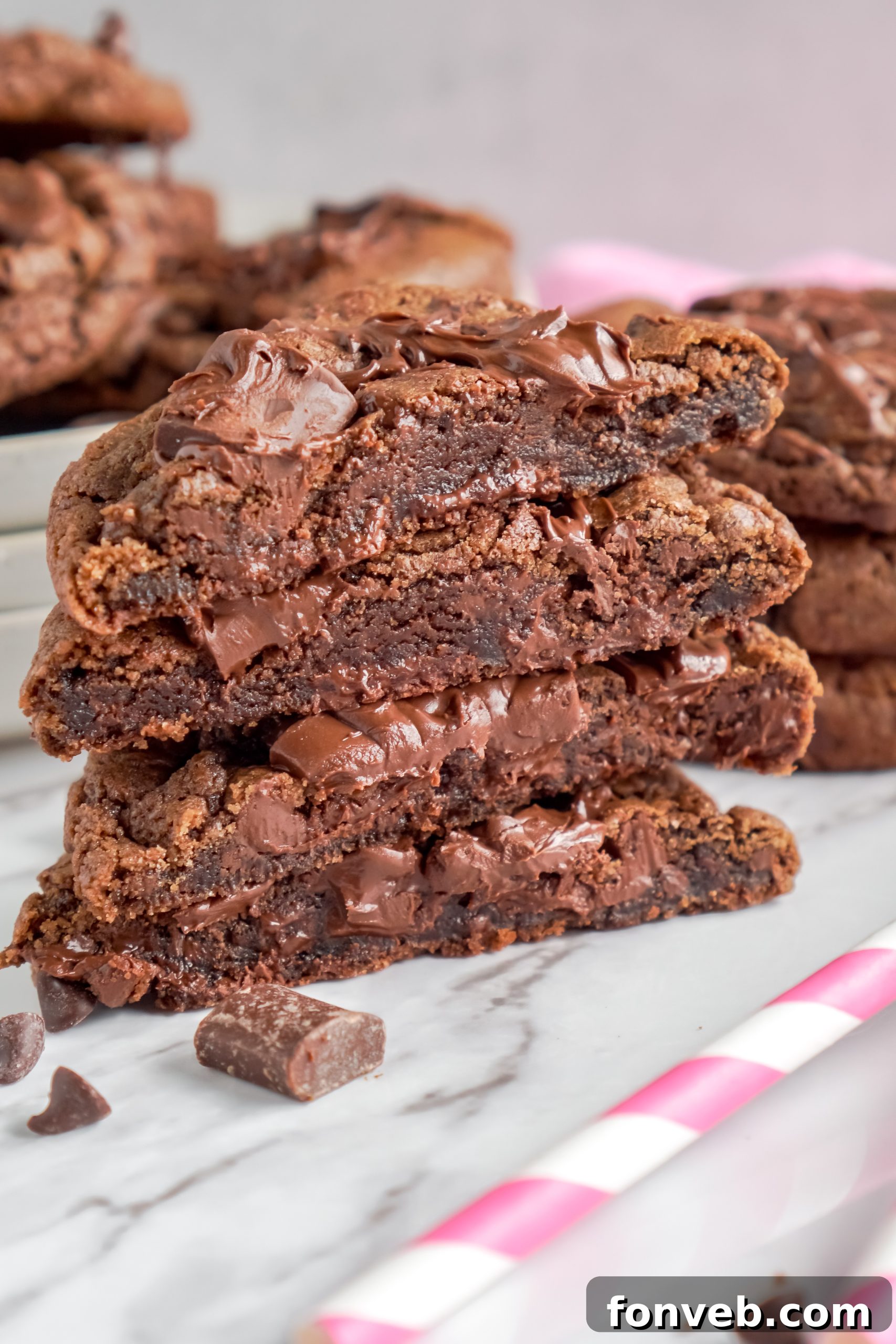 A scoop of cookie dough on a parchment-lined baking sheet