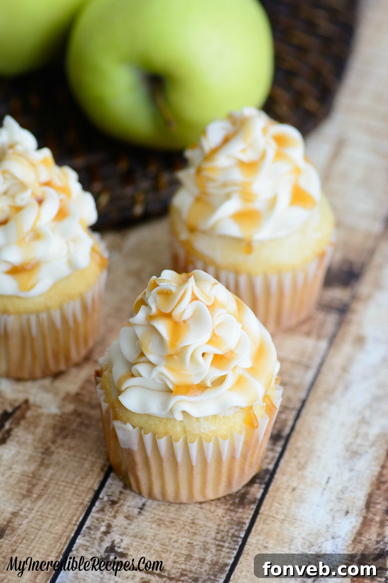 Artfully arranged caramel apple cupcakes, suggesting a festive gathering.