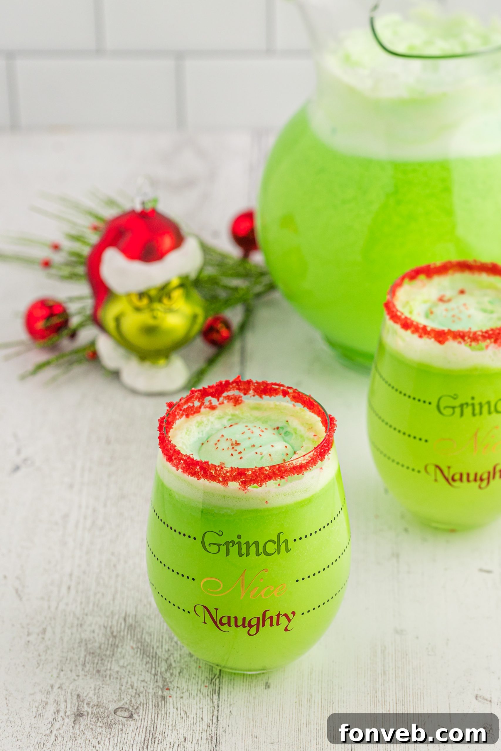 A refreshing glass of Grinch Punch, simple and delicious for any holiday gathering.