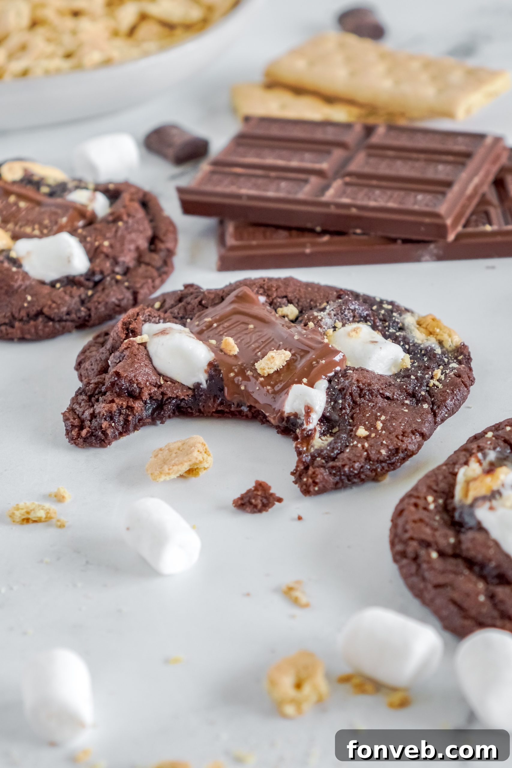 Pile of freshly baked Hershey's Chocolate S'mores Cookies with visible marshmallows