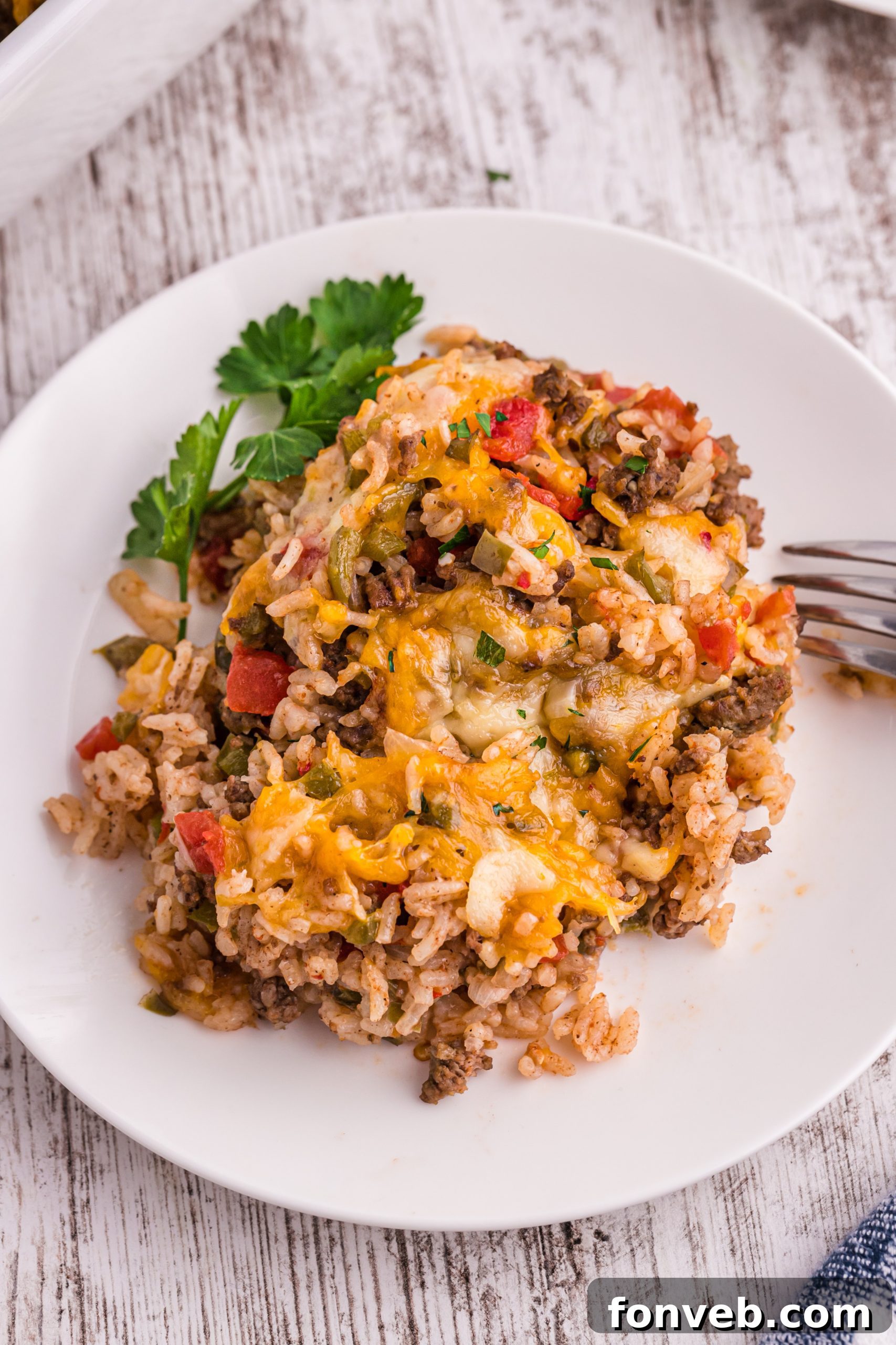 Close-up of ground beef and diced peppers in a skillet