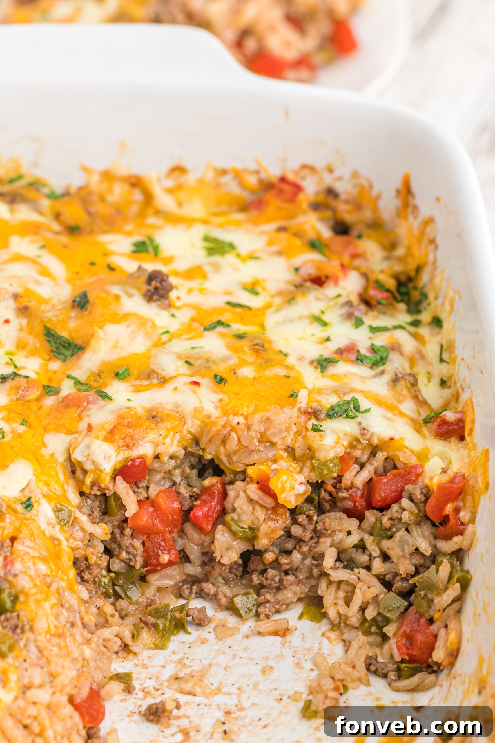 Stuffed bell pepper casserole in a white baking dish