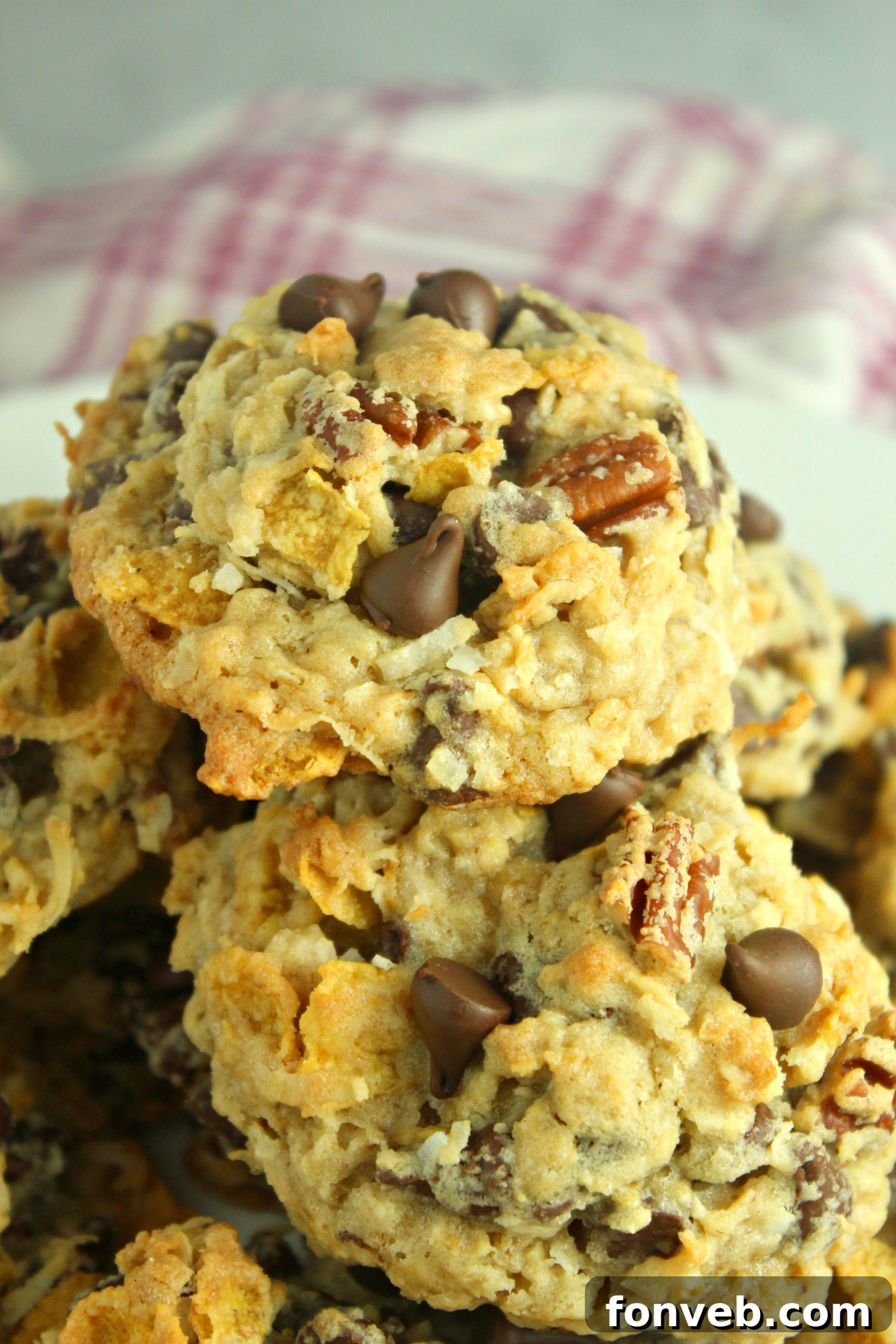 Delicious Cowboy Cookies plated with a glass of milk, perfect for a treat.