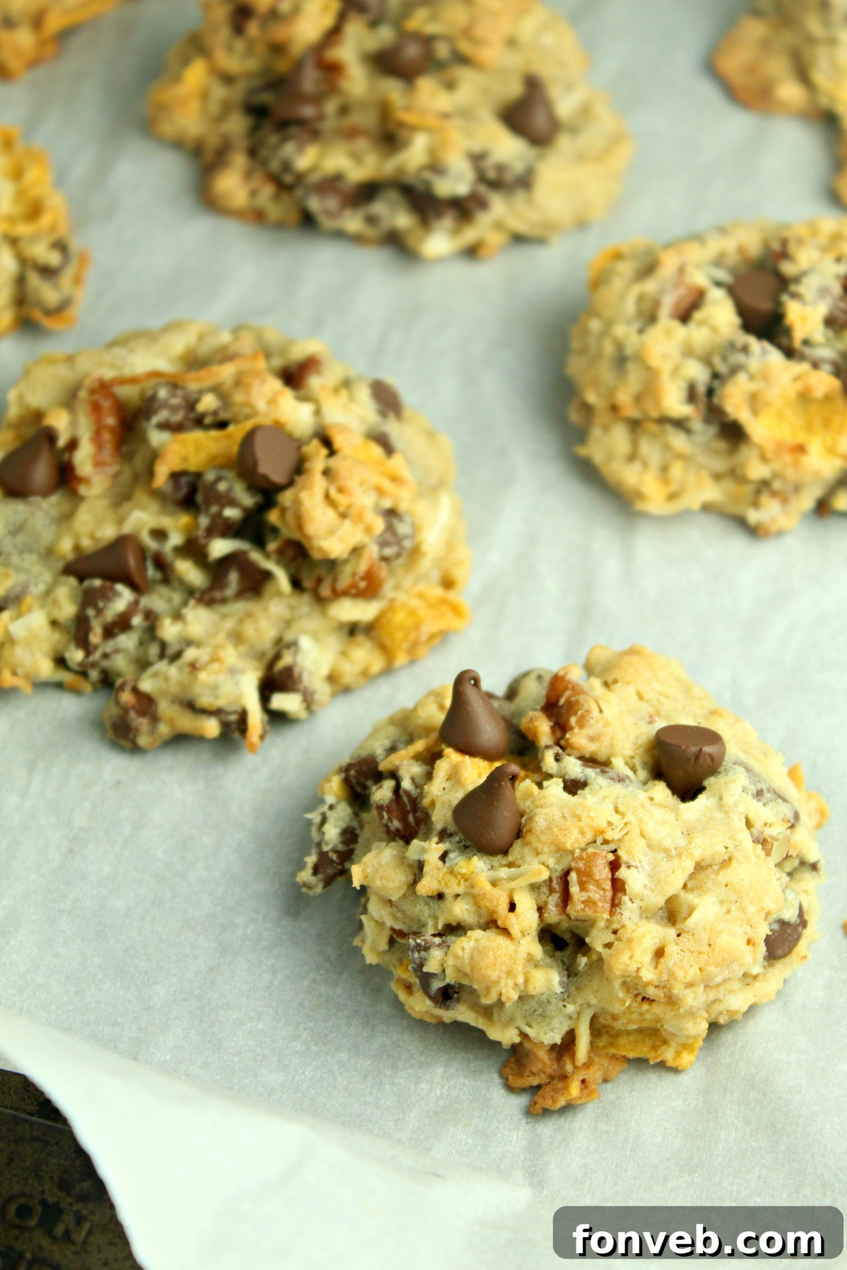 A close-up of a Cowboy Cookie showing the melted chocolate chunks and other mix-ins.