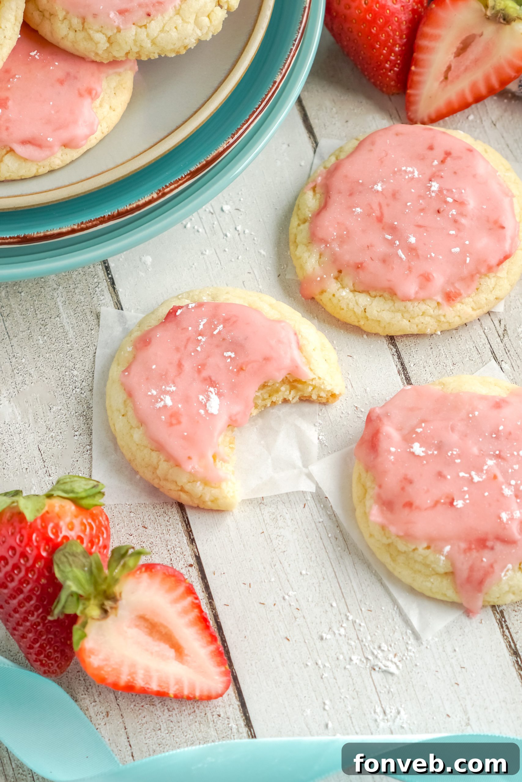All the fresh ingredients laid out, including vibrant strawberries, butter, and flour, ready for baking.