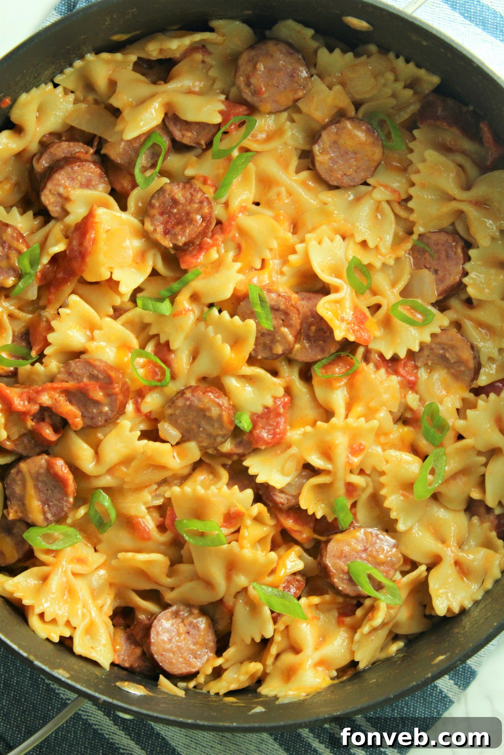 Kielbasa slices in the pan