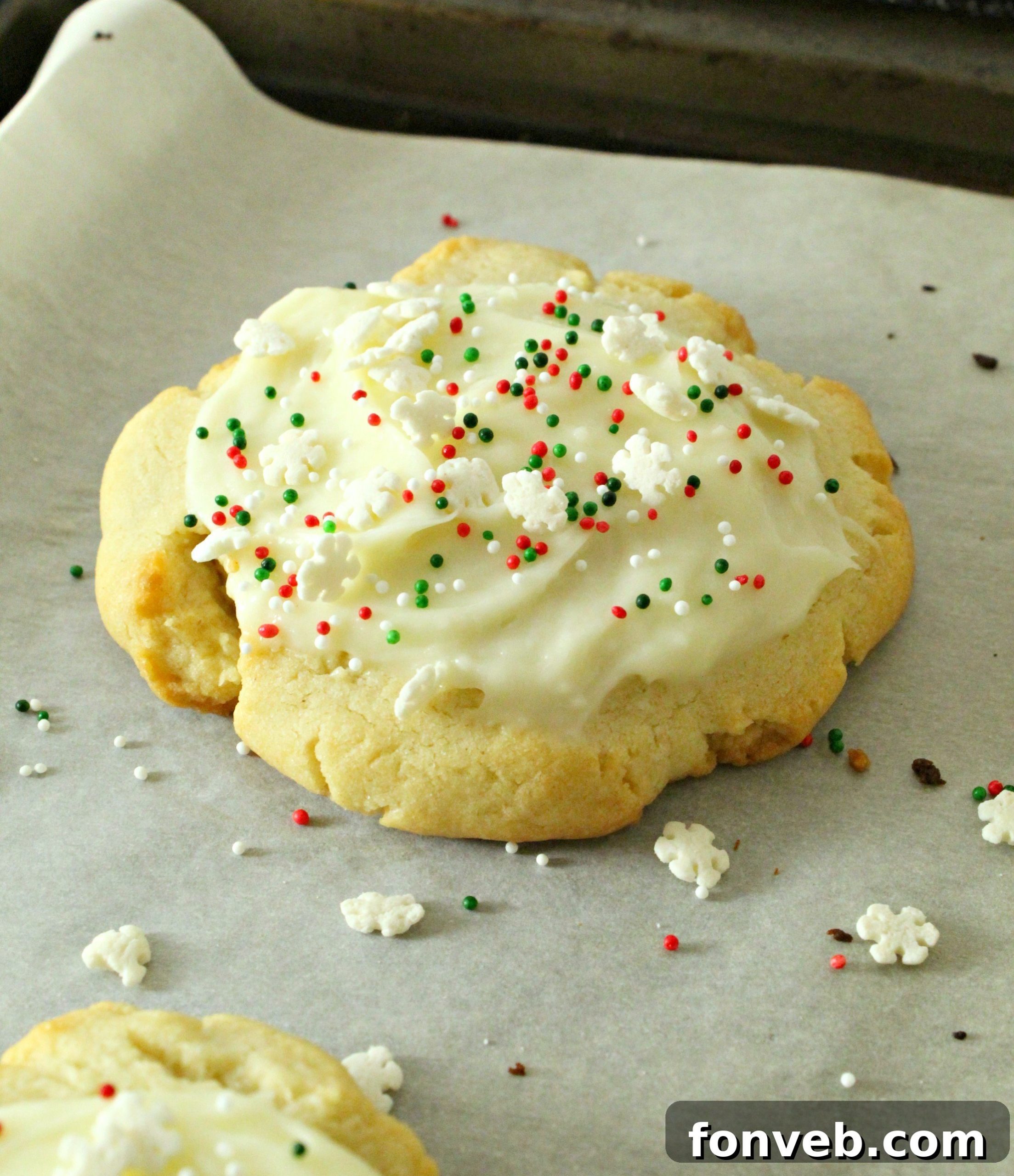 A stack of beautifully frosted Swig Sugar Cookies, showcasing the thick, creamy buttercream.