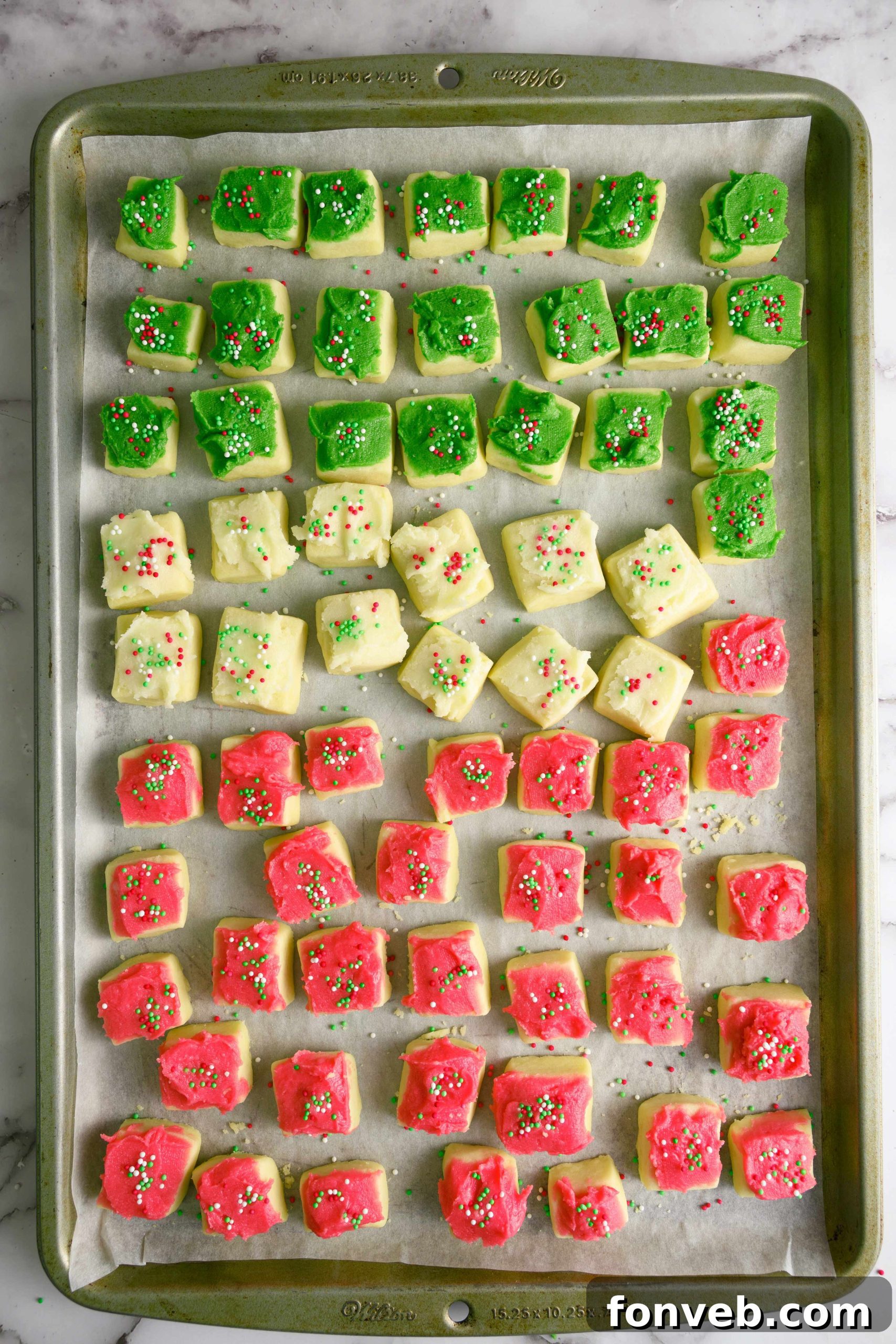 Festive Sugar Cookie Morsels 3 Close-up of frosted Christmas Sugar Cookie Bites with sprinkles