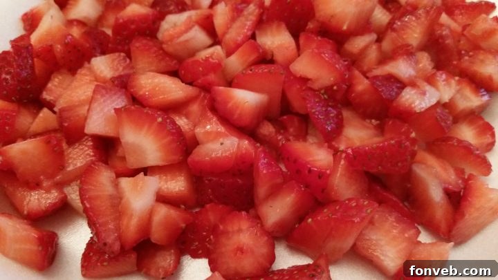 A delicious slice of strawberry shortcake with creamy layers