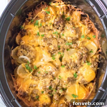 A dish of Slow Cooker Beef and Potato Au Gratin.