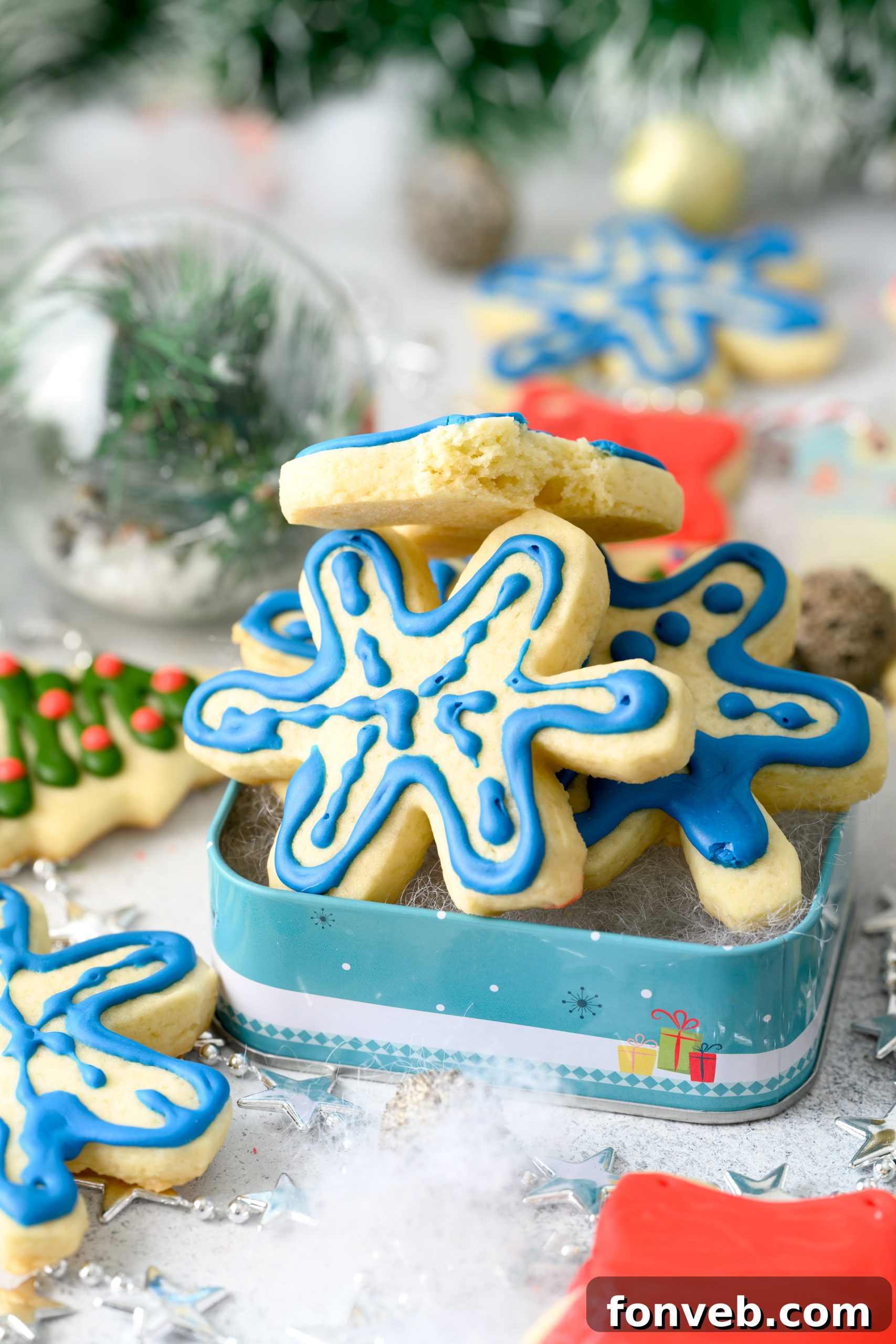 Perfectly baked sugar cookies ready for decorating, a golden-brown hue and smooth edges.