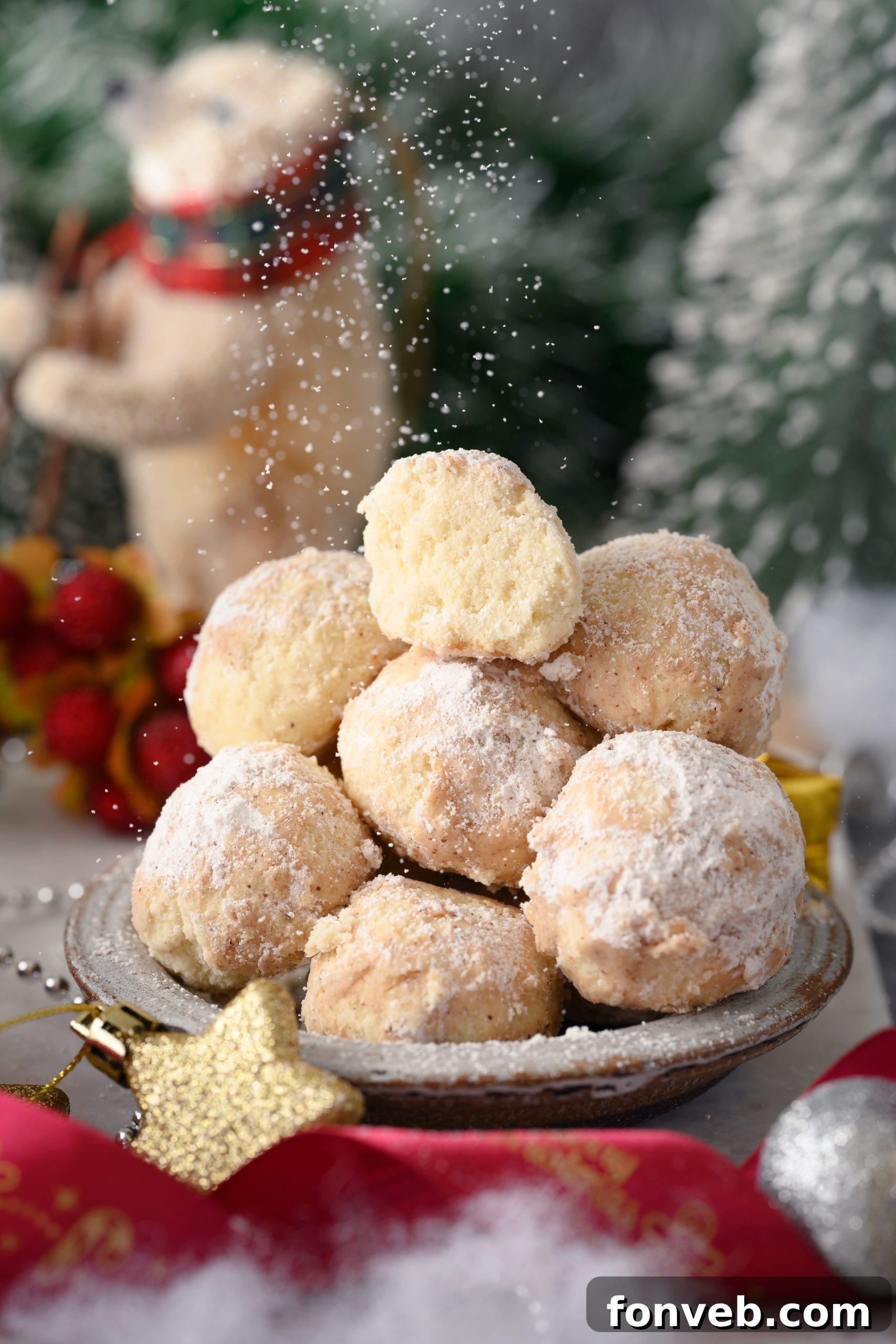 Delicious Cinnamon Mexican Wedding Cookies coated in powdered sugar