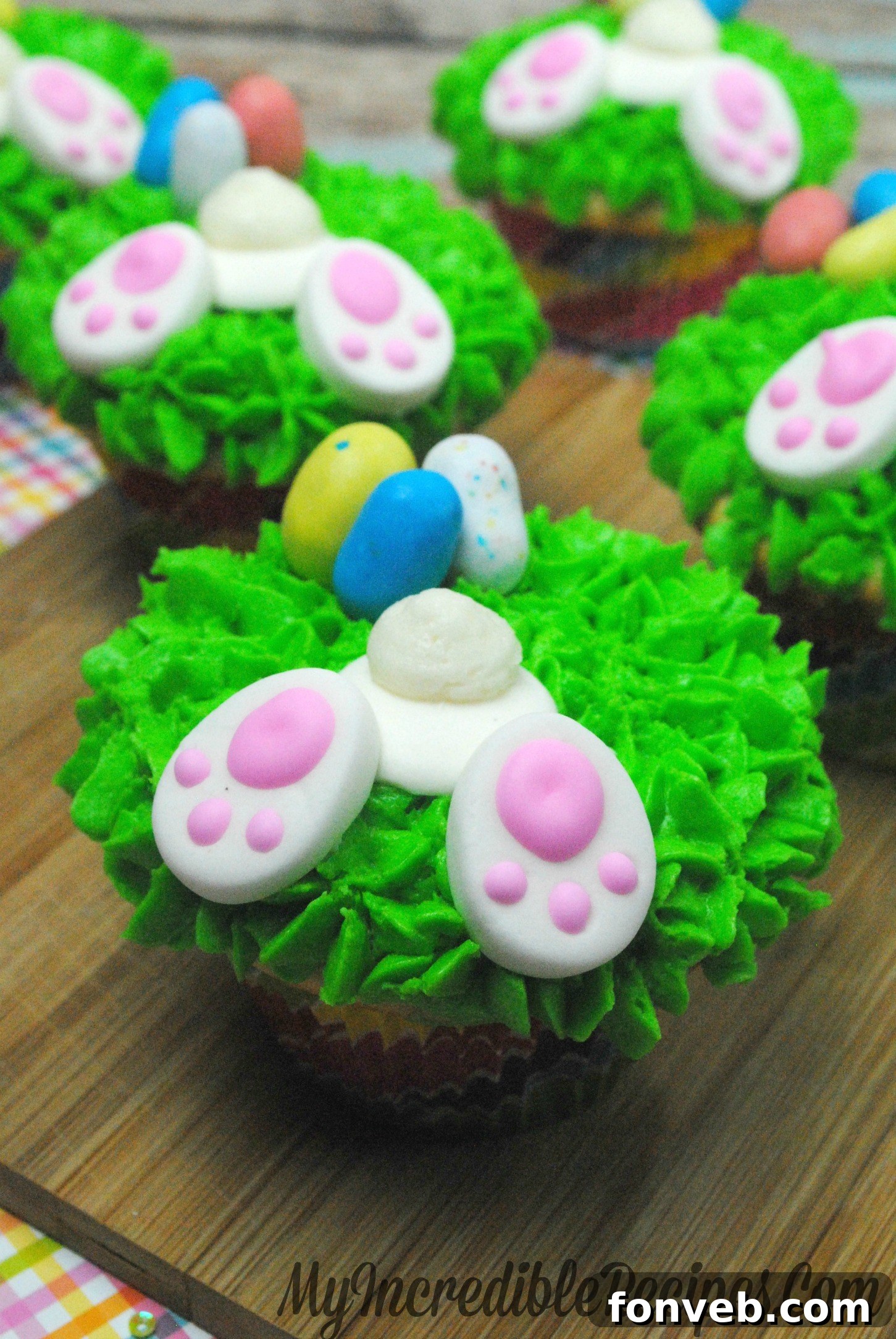 A single Easter bunny butt cupcake presented on a plate, ready to be enjoyed.