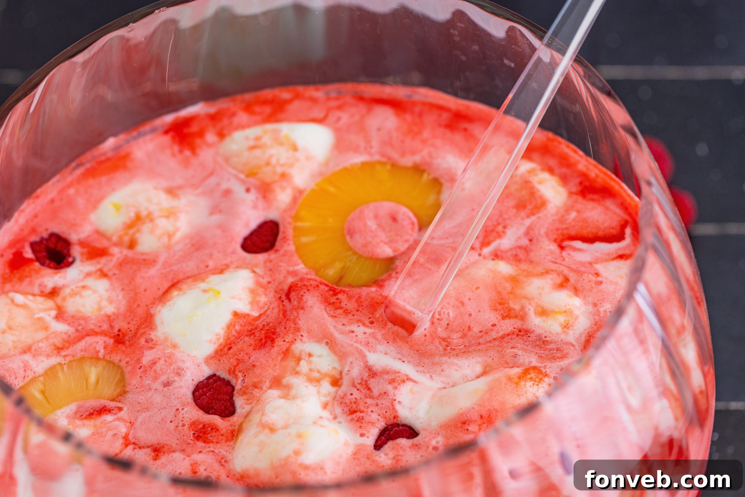 Strawberry Jell-O cubes in a bowl, ready to be added to punch as a non-diluting ice alternative.