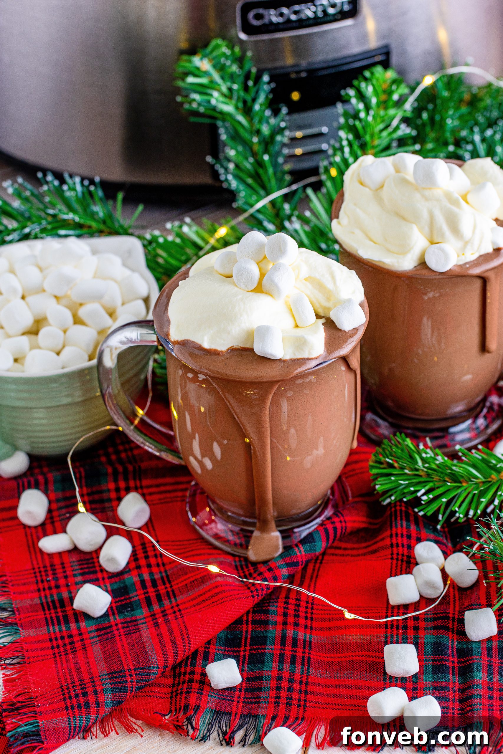 A close-up shot capturing the thick, pourable consistency of the hot chocolate as it's gently stirred in the slow cooker.
