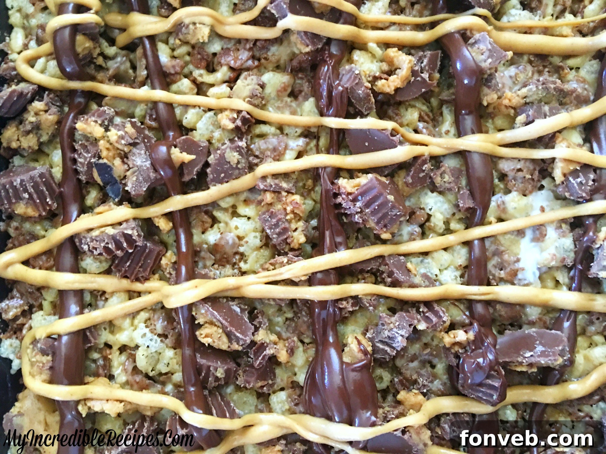 Close-up of Reese's Peanut Butter Cups on top of Krispies Treats