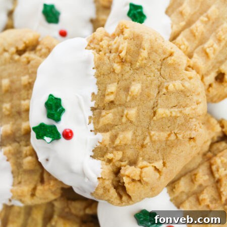 Recipe card image of a white chocolate dipped peanut butter cookie with sprinkles