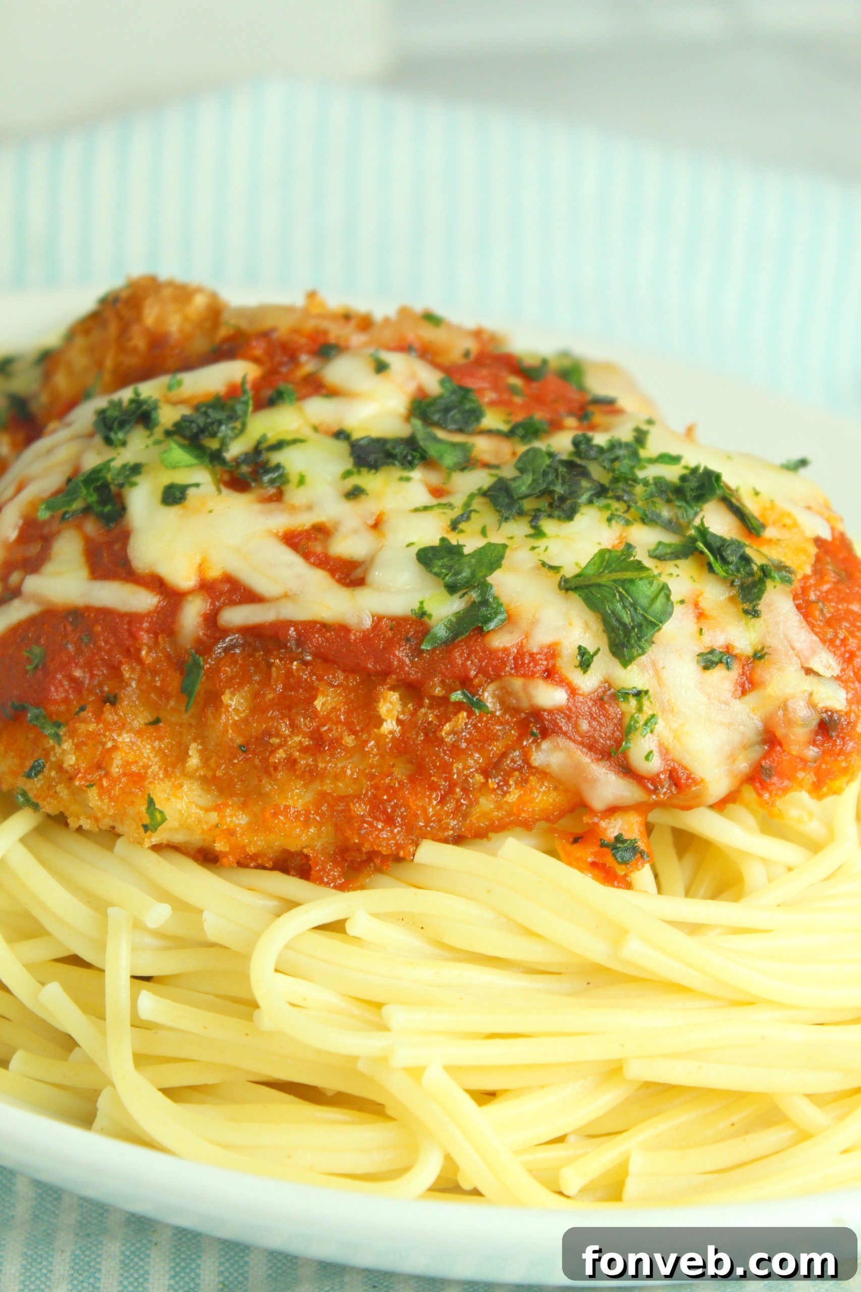 A bowl of granulated sugar, an ingredient for the sauce.