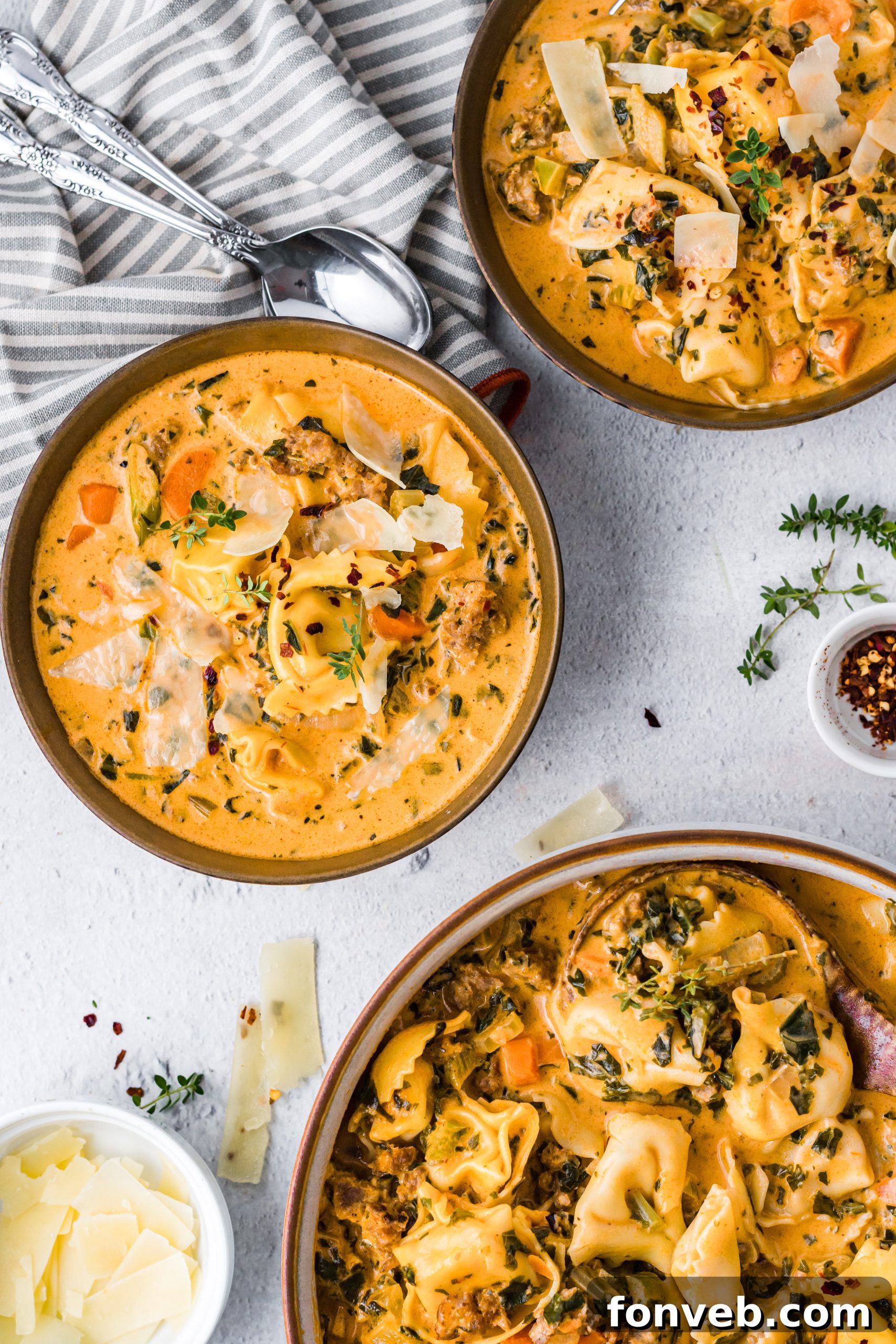 A serving of creamy tortellini soup, highlighting the tortellini pasta