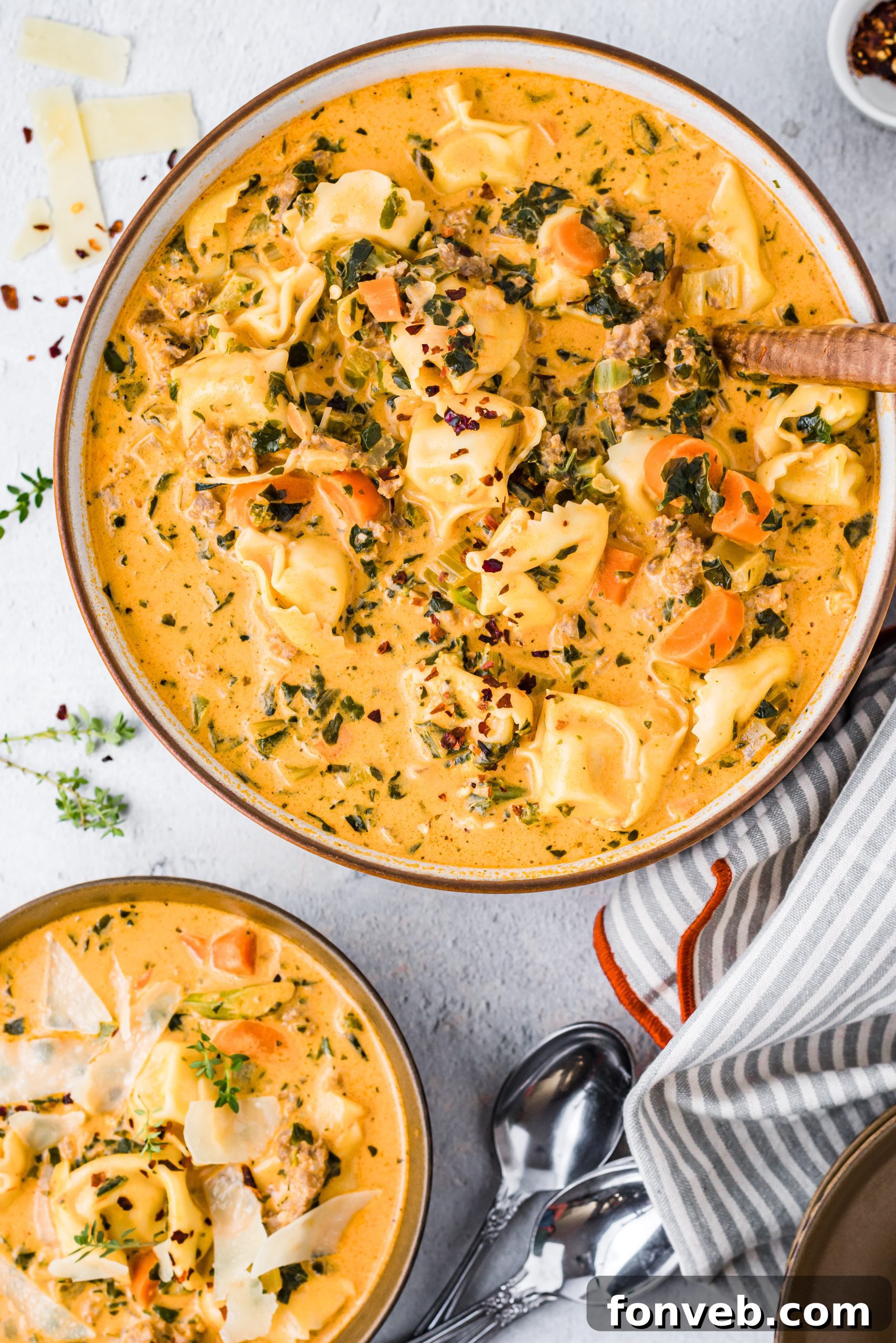 Ingredients for creamy tortellini soup laid out