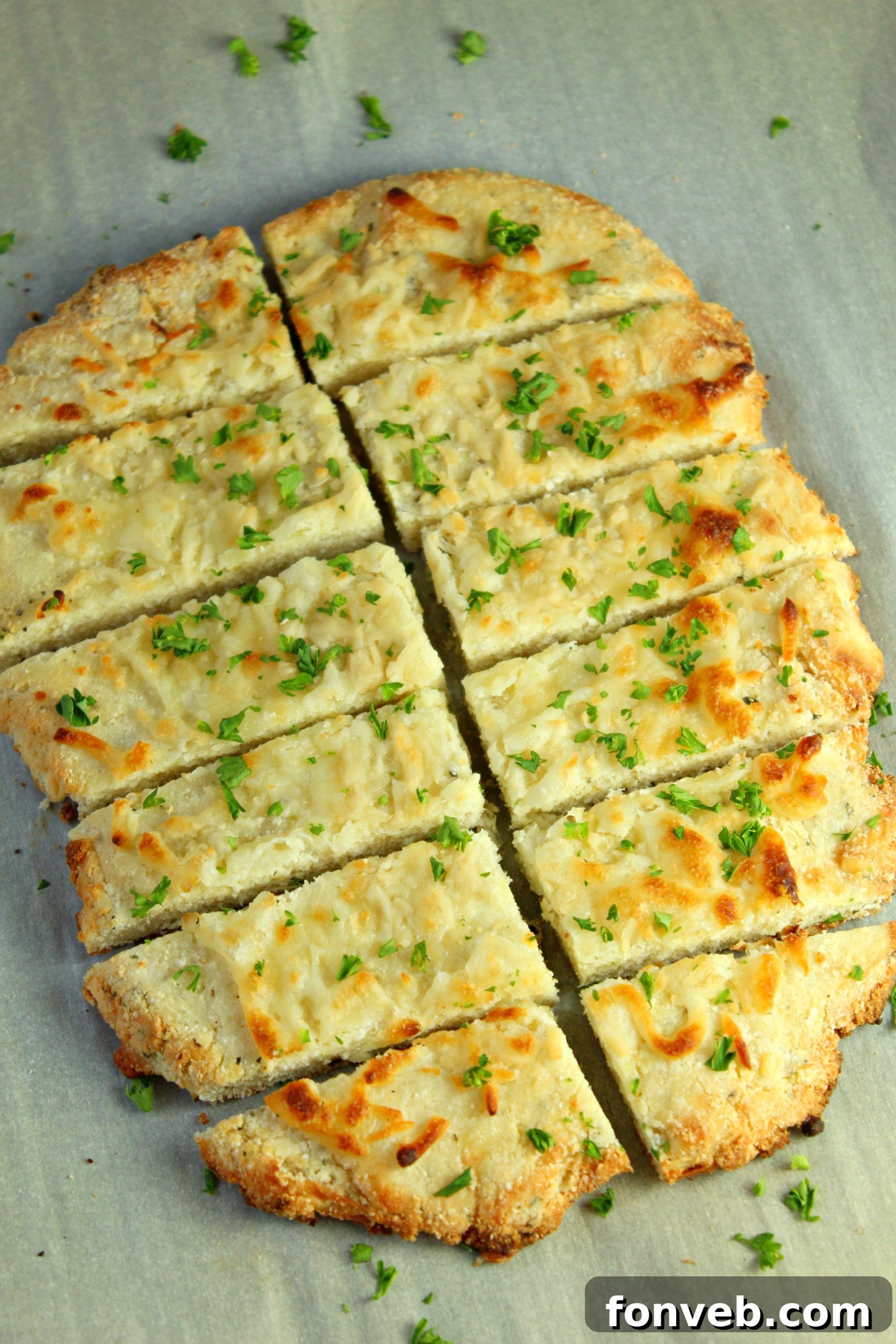 Blocks of various cheeses and a grater, demonstrating how to create a custom cheese blend.
