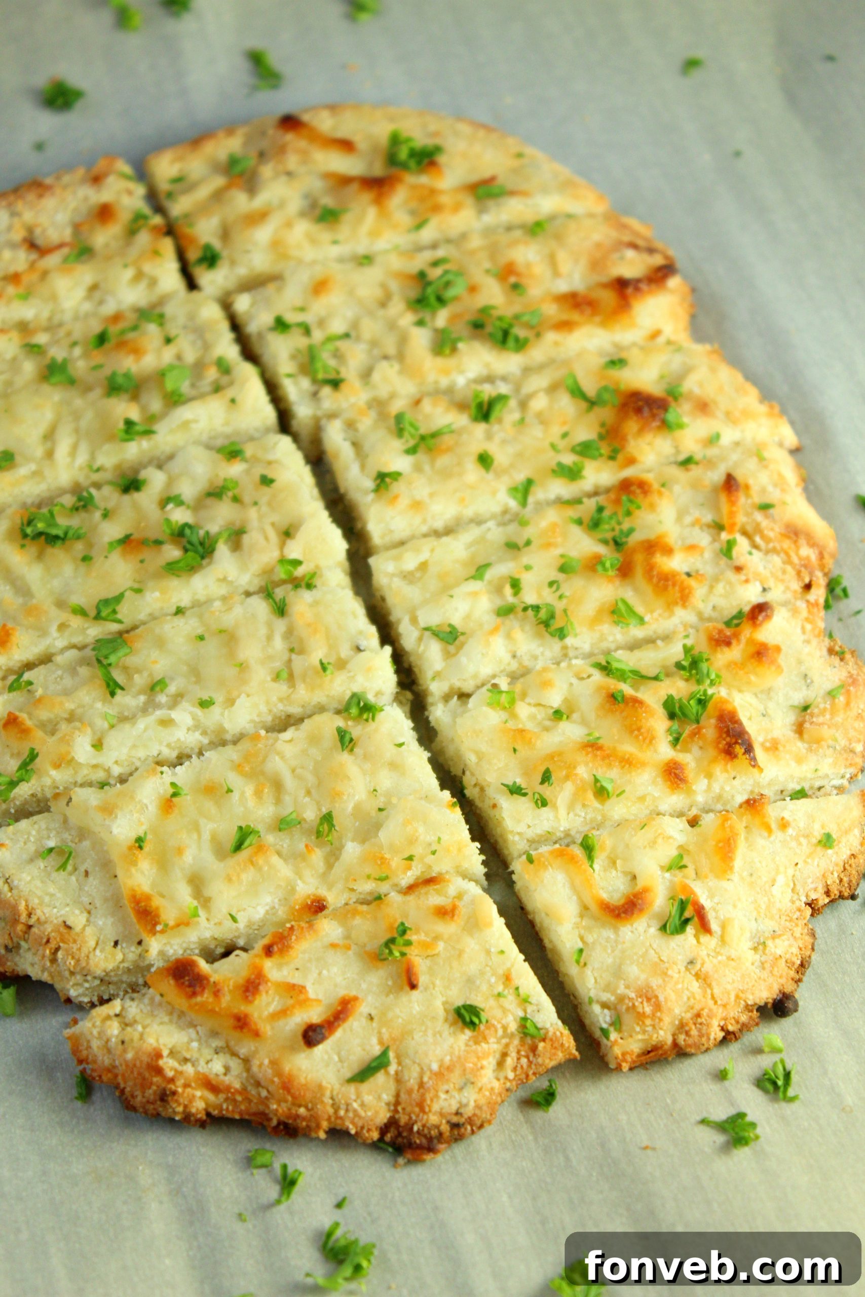 A vibrant, healthy salad served with the four cheese keto breadsticks.