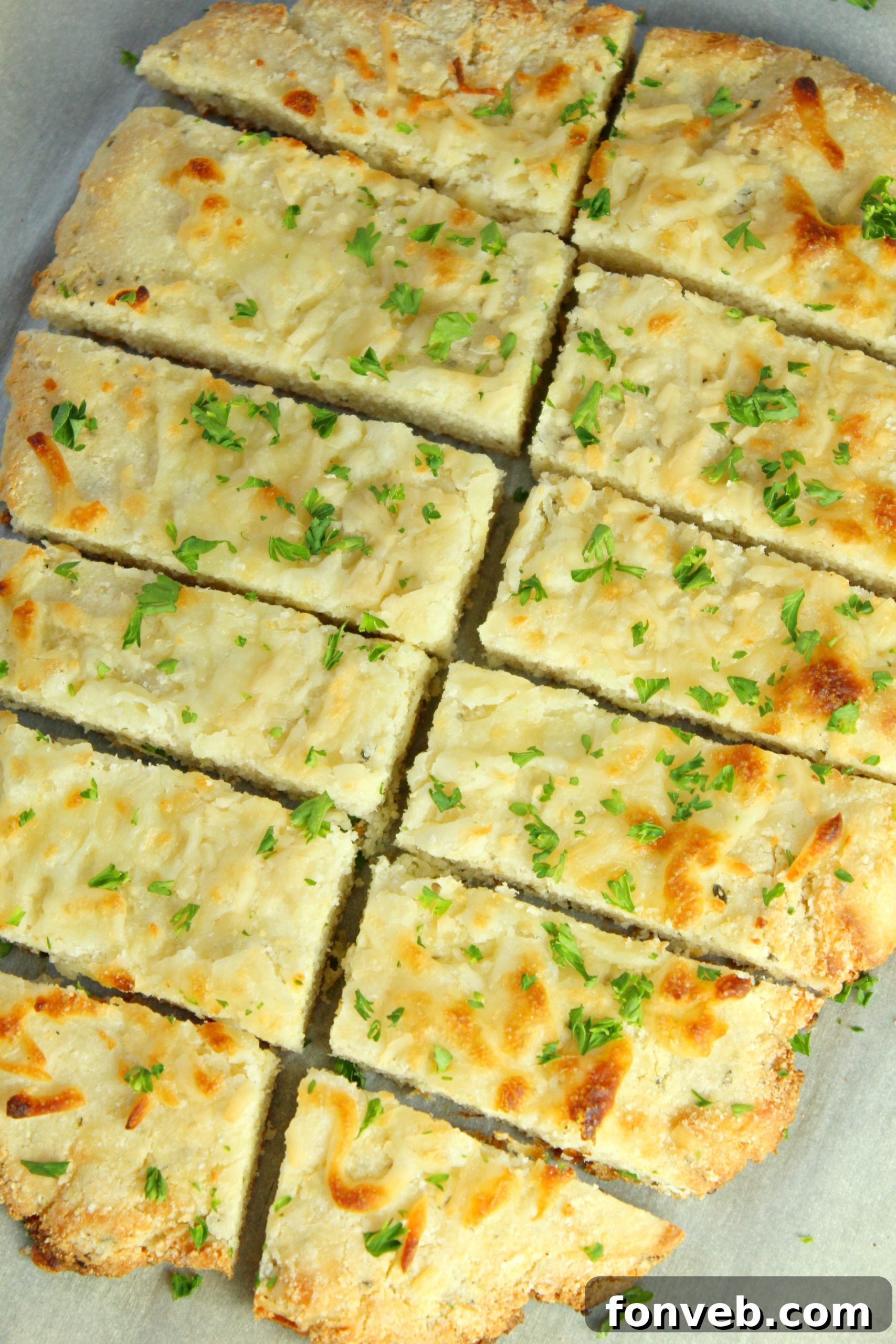 Softened cream cheese in a bowl, a key ingredient for the keto breadstick dough.