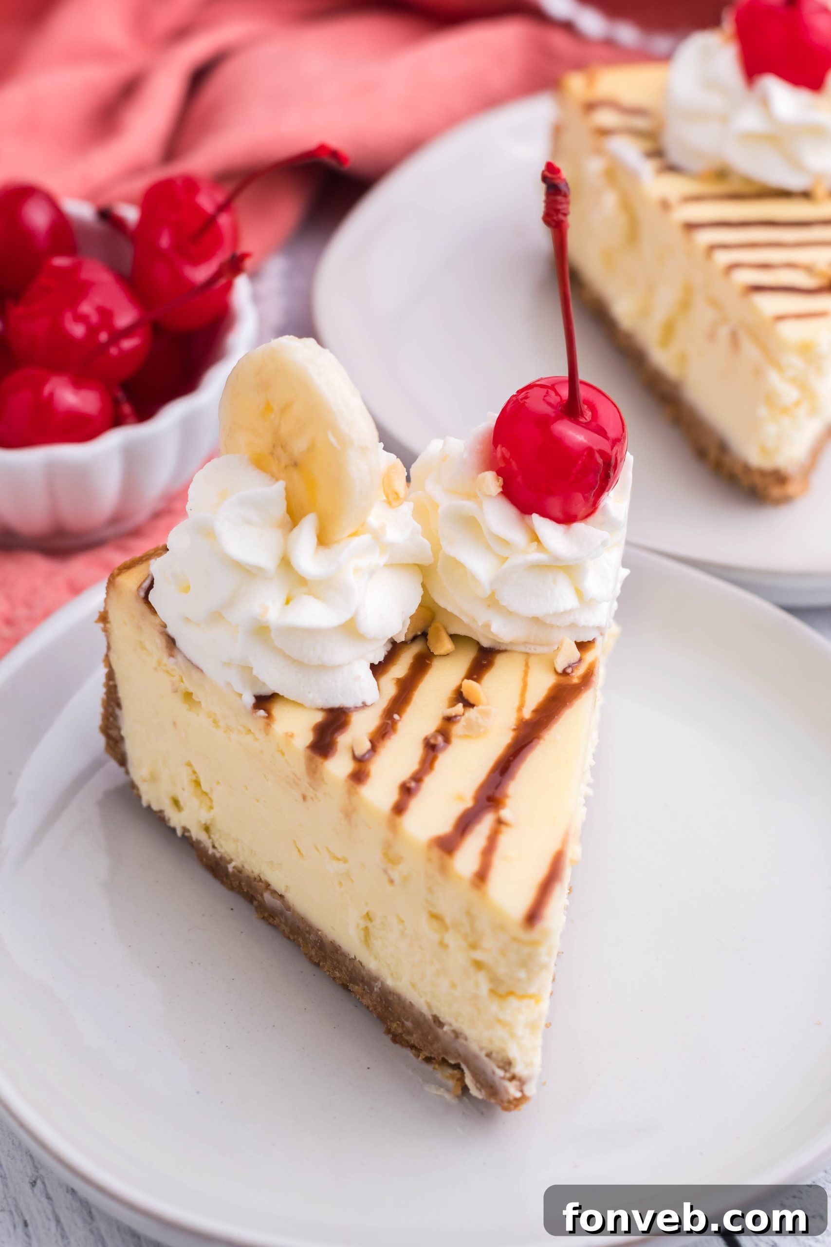 A final, mouth-watering image of the Banana Split Cheesecake, ready for enjoyment.