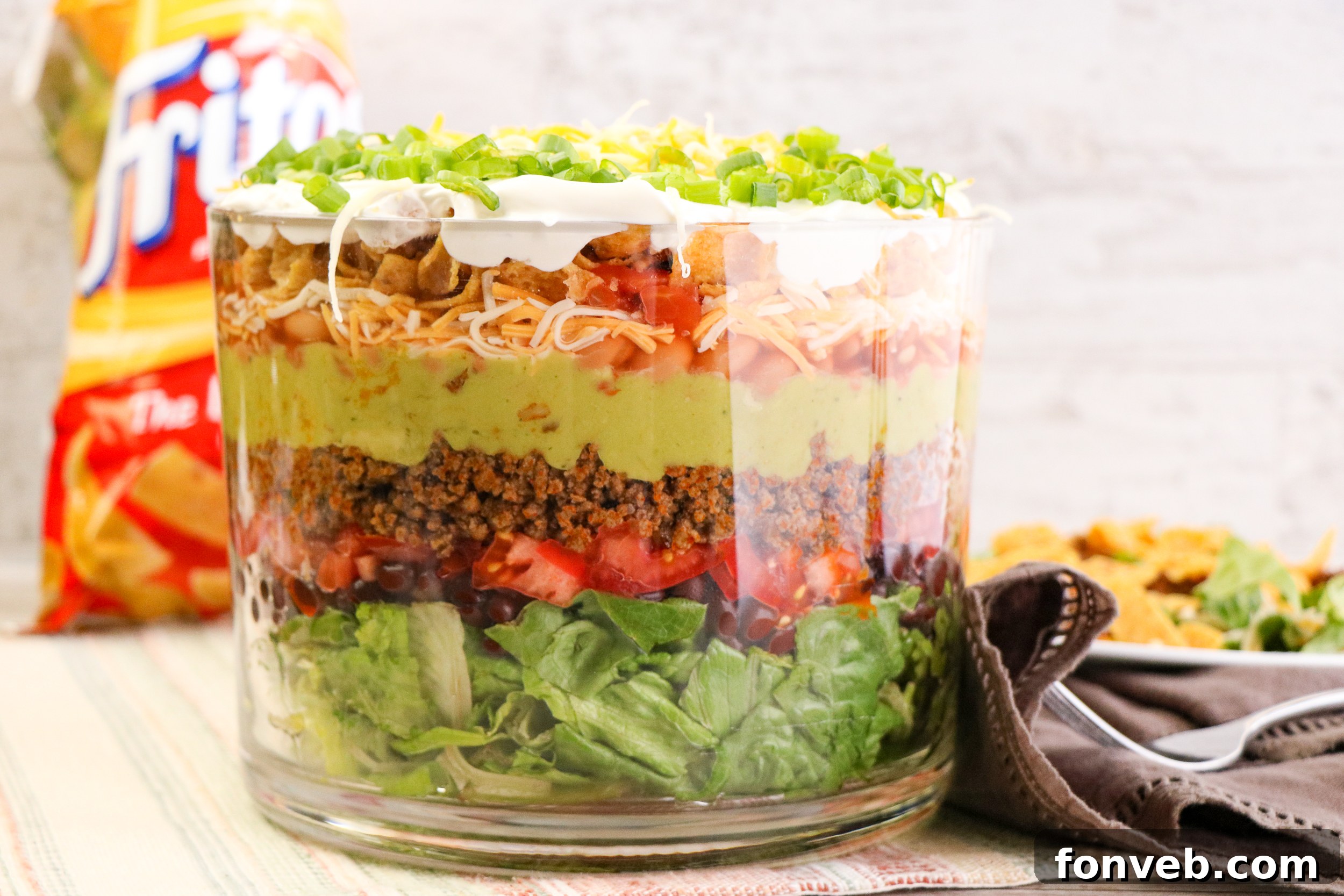 Taco Fiesta Stack 3 Close-up of a layered Taco Salad Trifle with vibrant colors