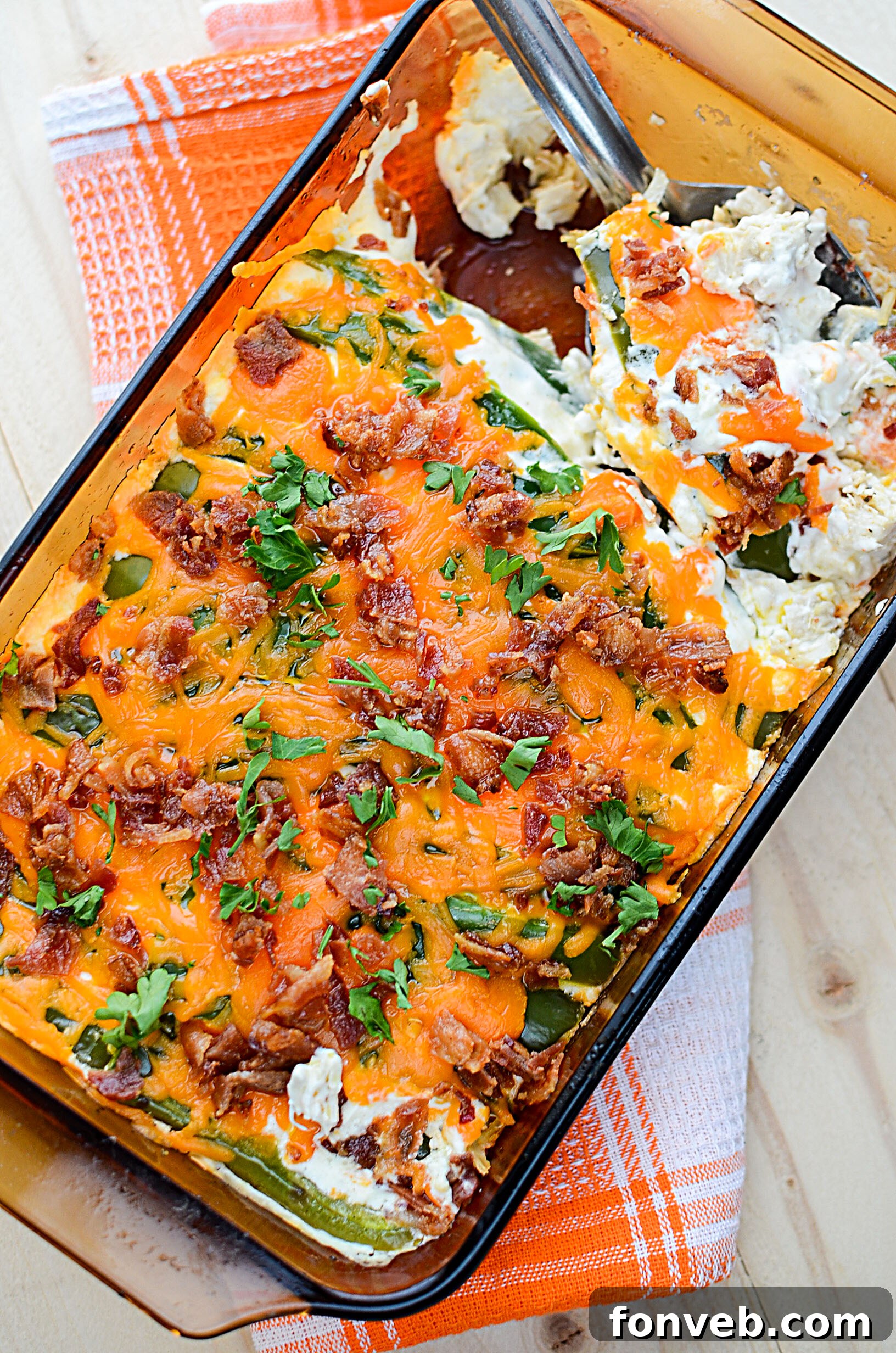 Close-up of shredded sharp cheddar cheese, a key ingredient for the casserole.