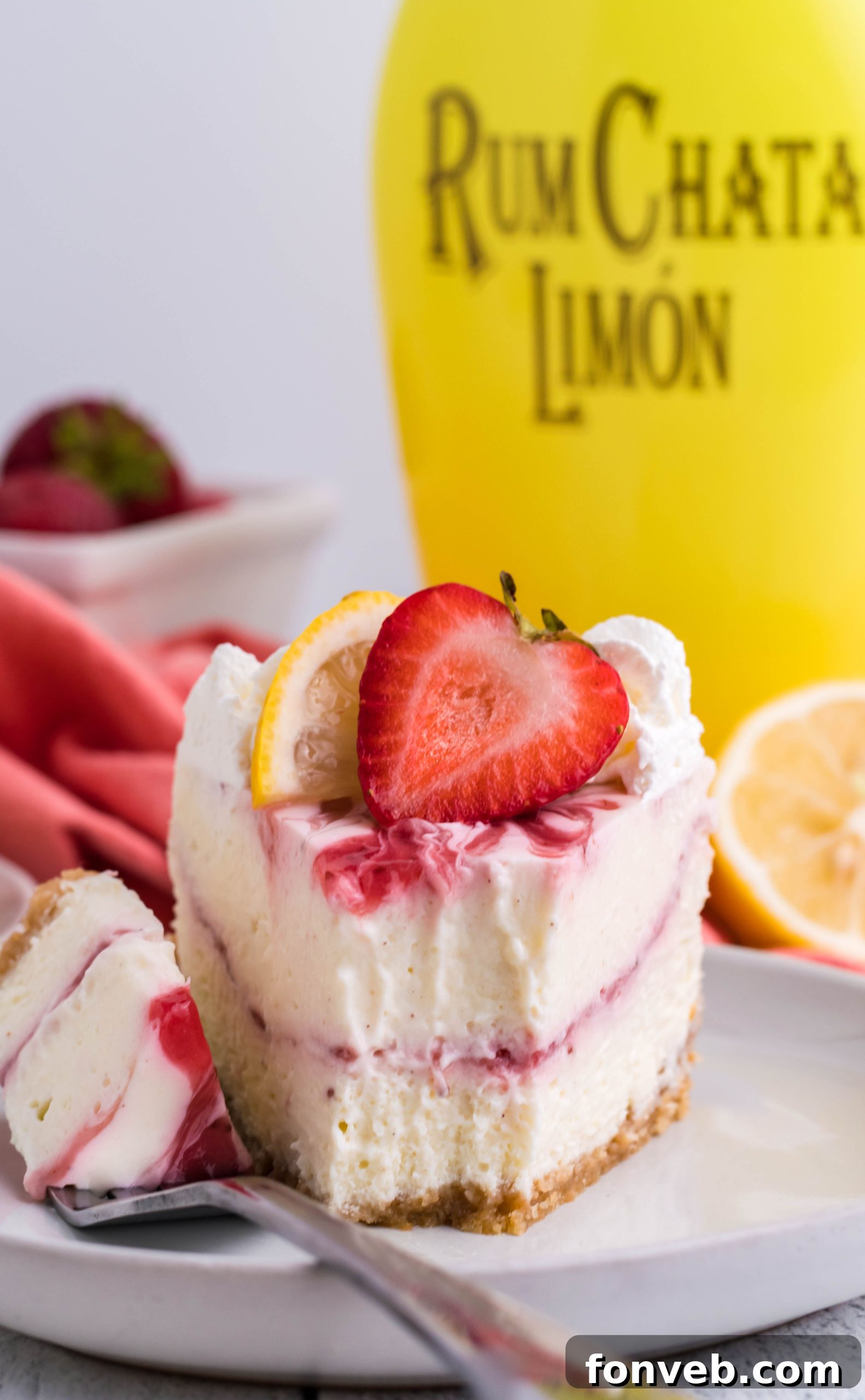 The full Strawberry Lemon RumChata cheesecake, beautifully presented.