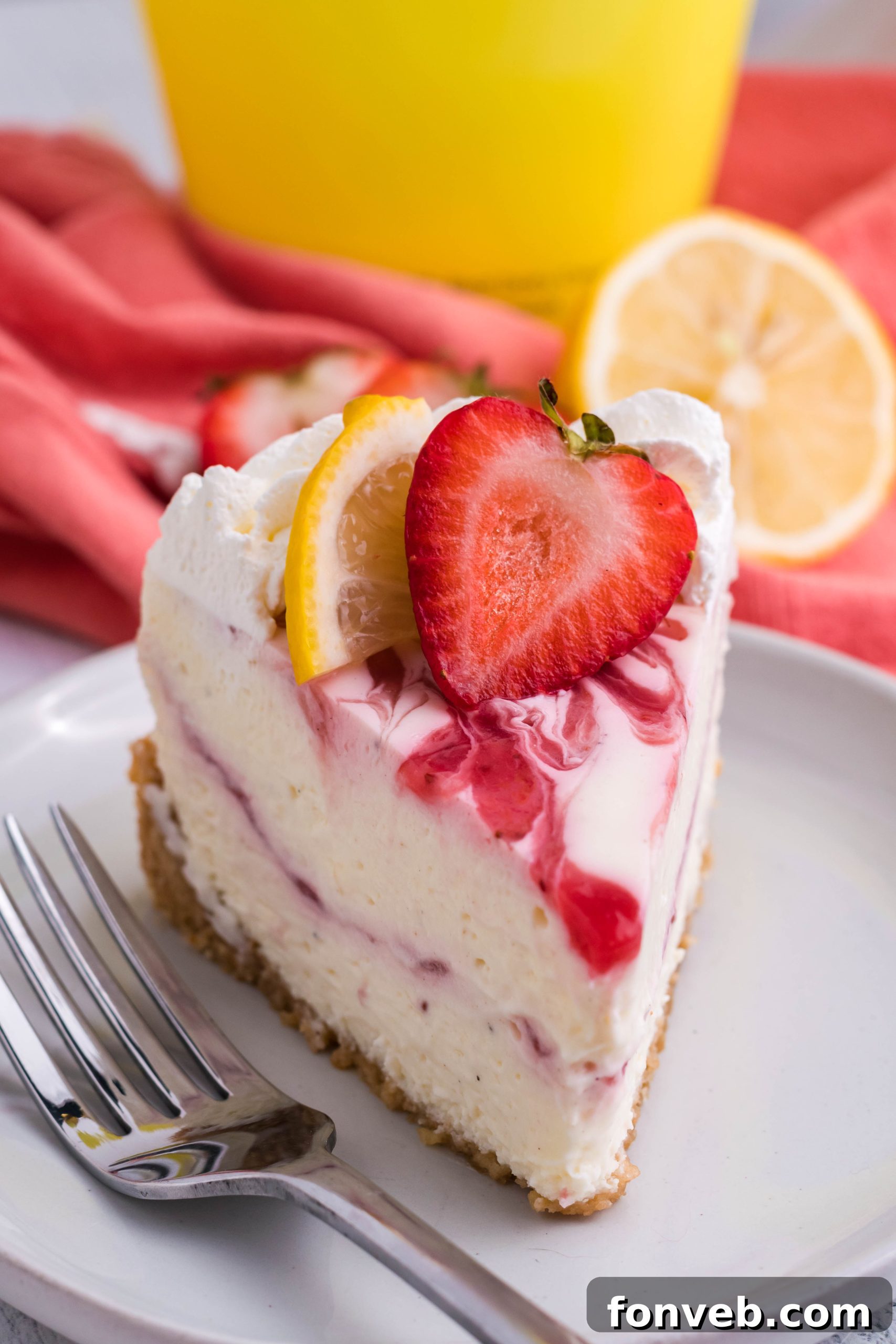 Various ingredients for the cheesecake, including Nilla wafers, strawberries, and RumChata.