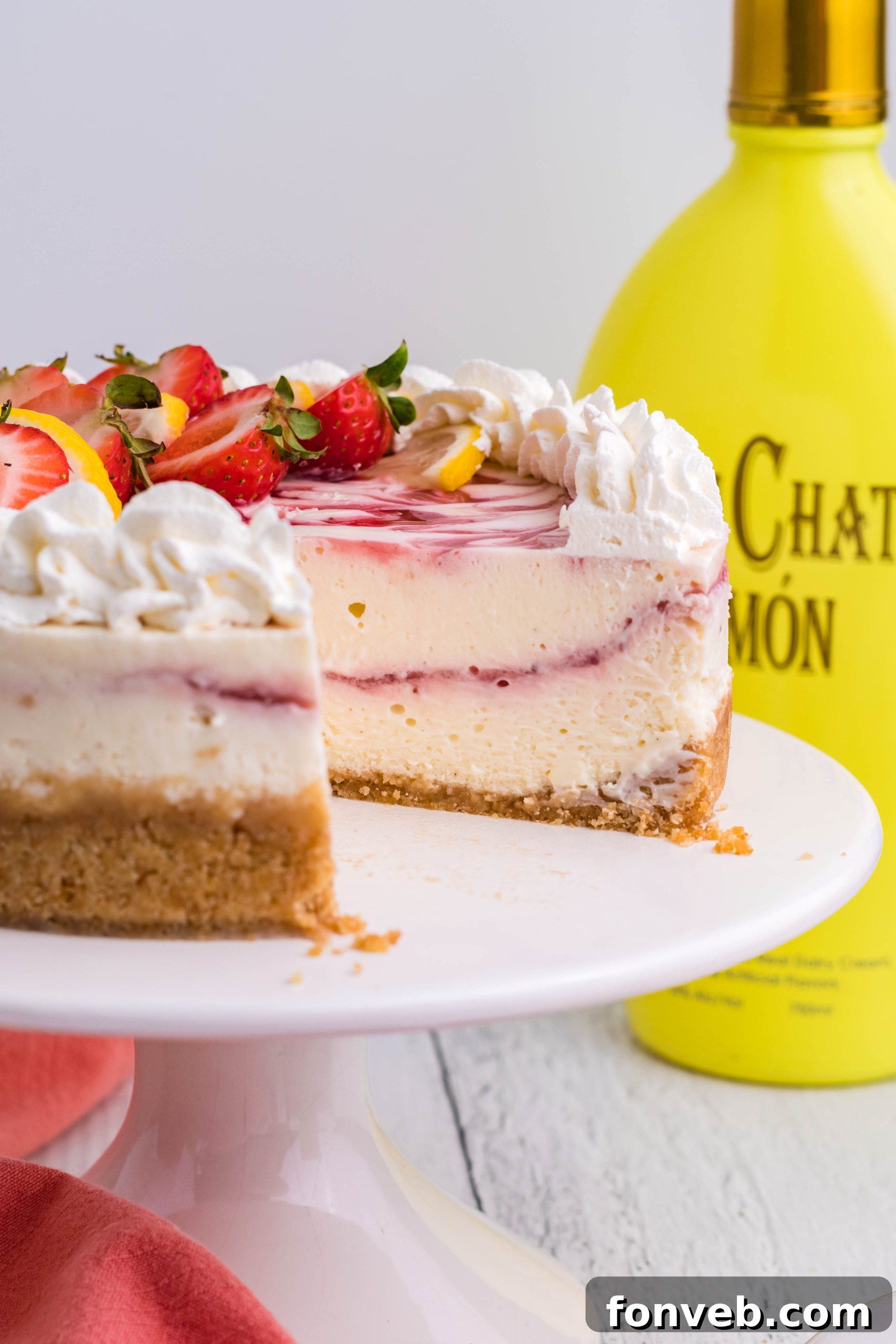 Various ingredients laid out, including cream cheese, RumChata, and vanilla extract.