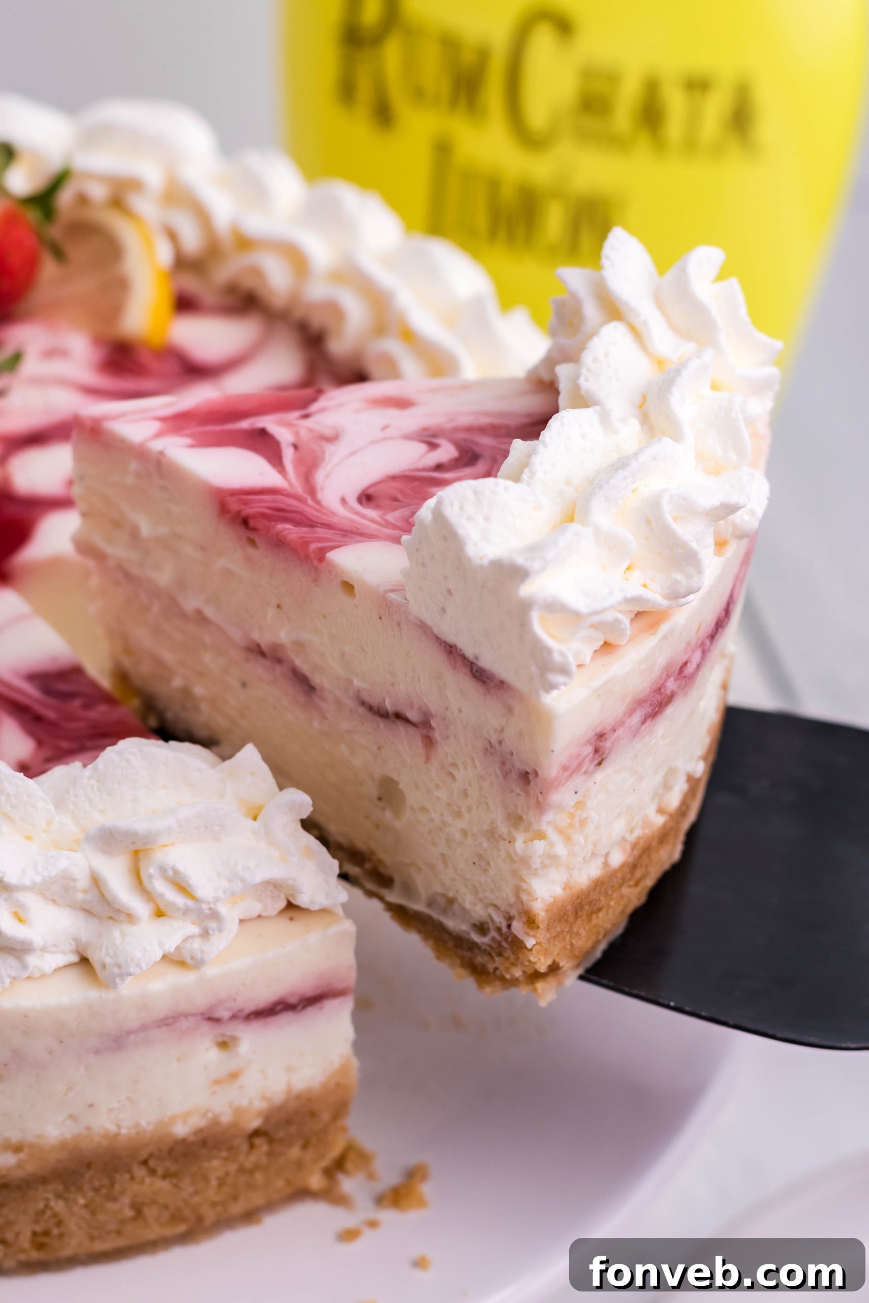 The cheesecake being carefully placed into the Instant Pot.