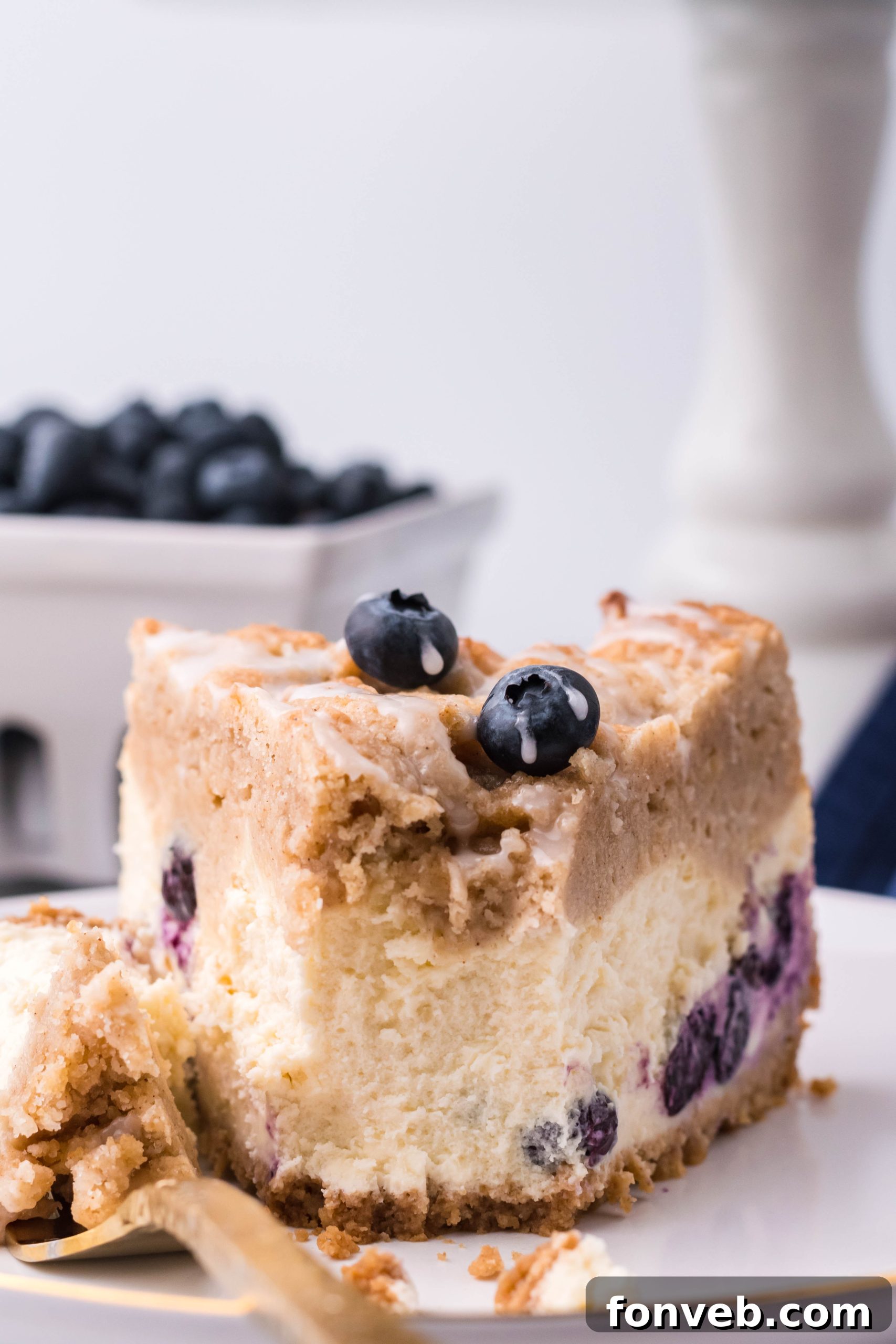 Blueberry Coffee Cake Cheesecake with a glaze