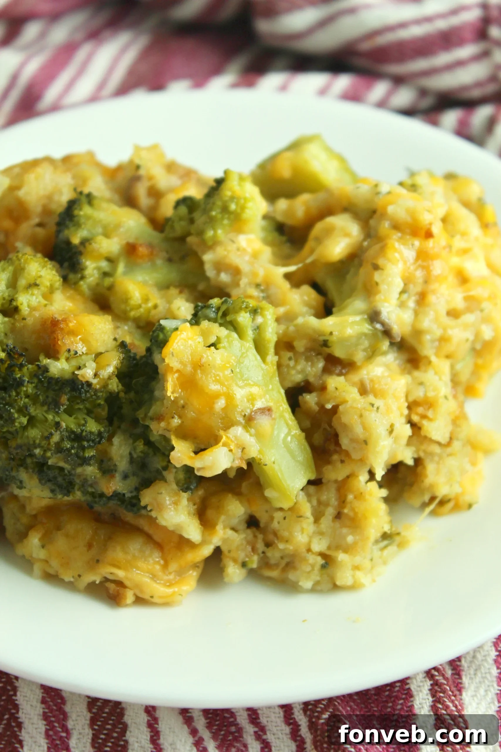 Plenty of cheesy chicken and broccoli casserole in a slow cooker, ready to eat
