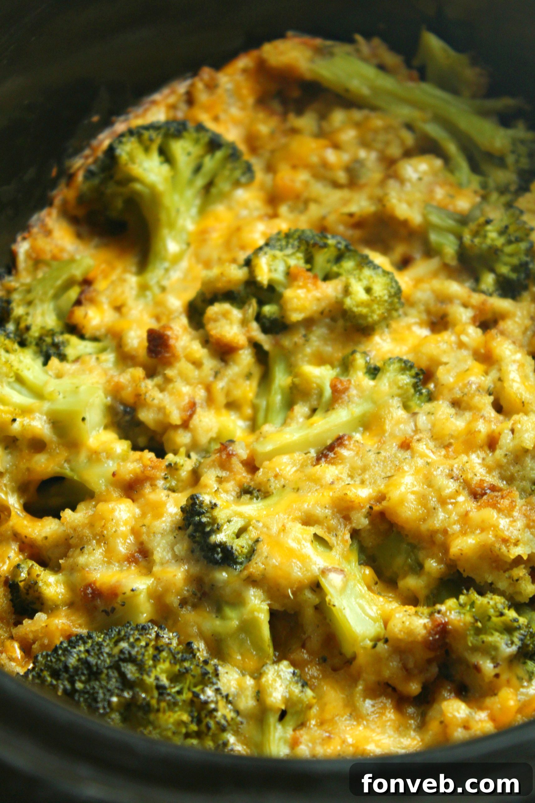 Close-up of golden brown, melted cheese on top of the casserole