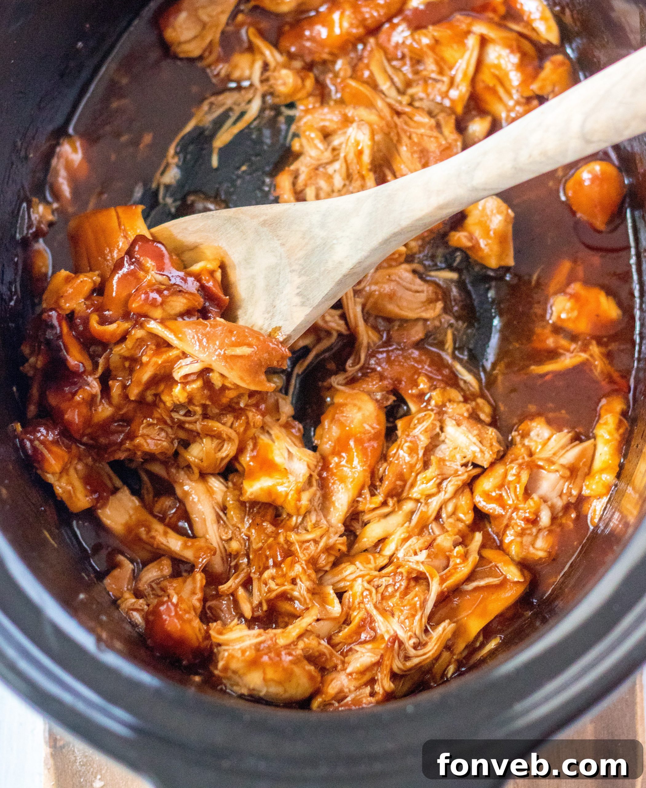 A bottle of root beer and barbecue sauce, key ingredients for the recipe