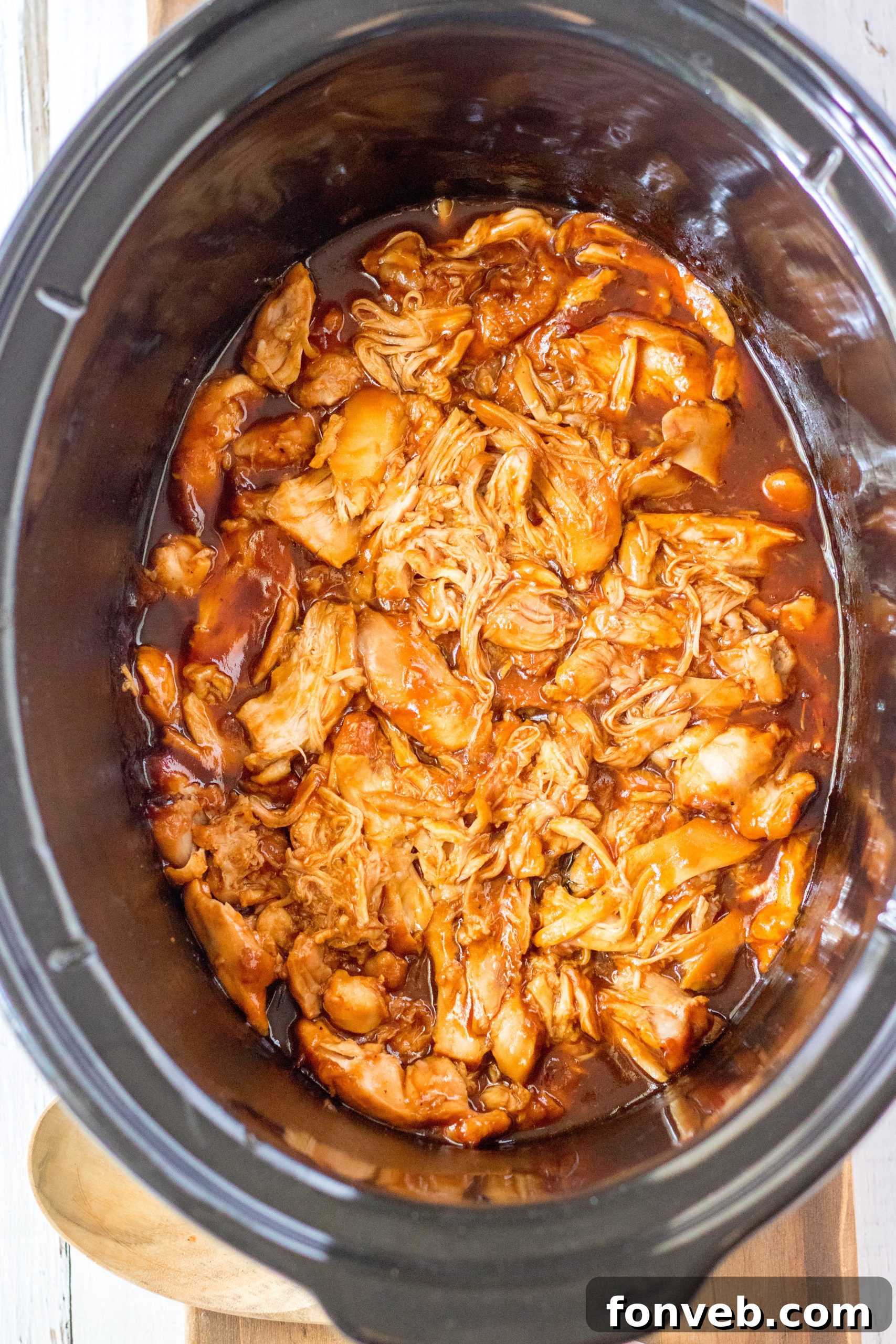 Serving of Slow Cooker Root Beer Chicken with a side of coleslaw