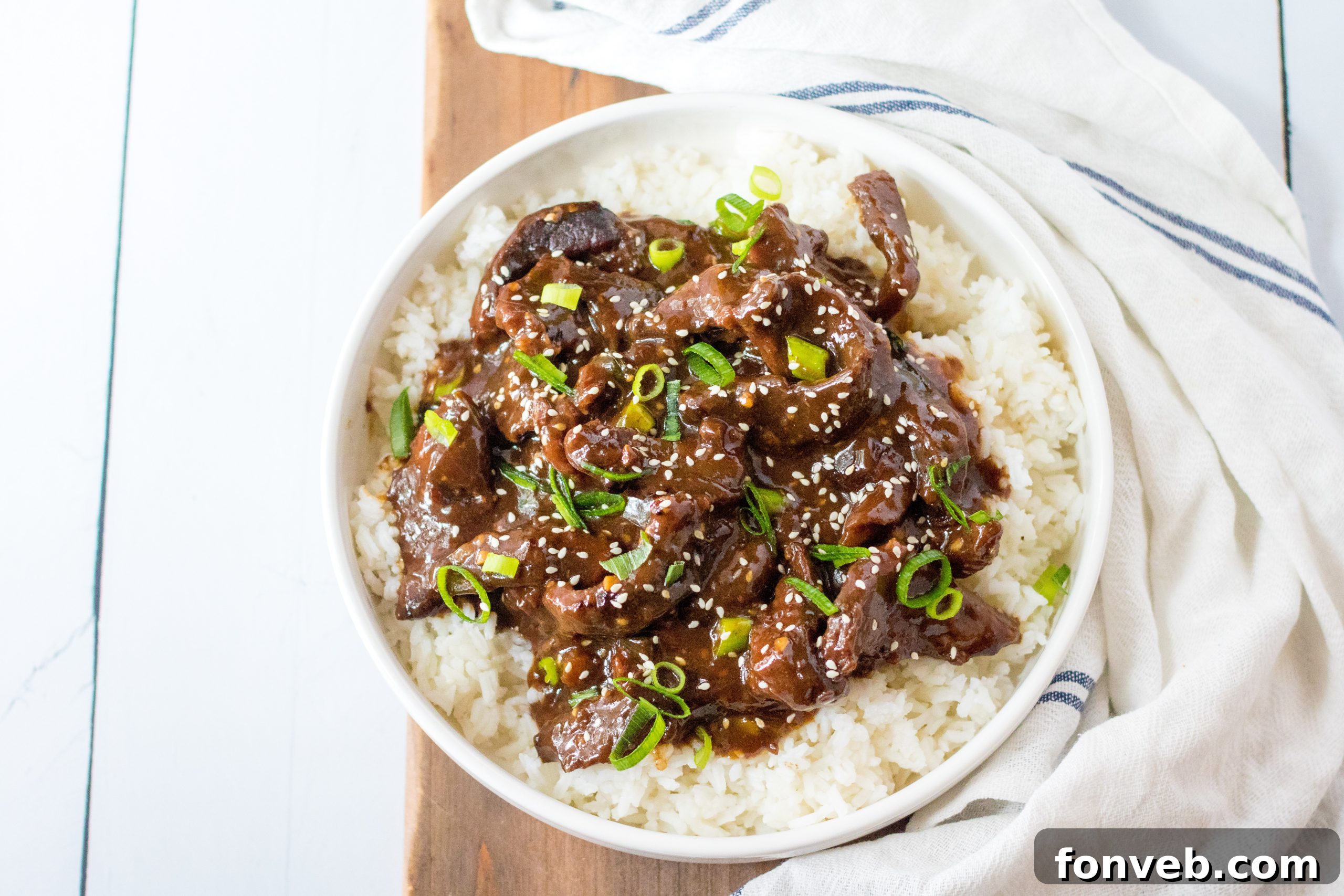 Slow Cooker Mongolian Beef Delight 12 Slow Cooker Mongolian Beef served with white rice