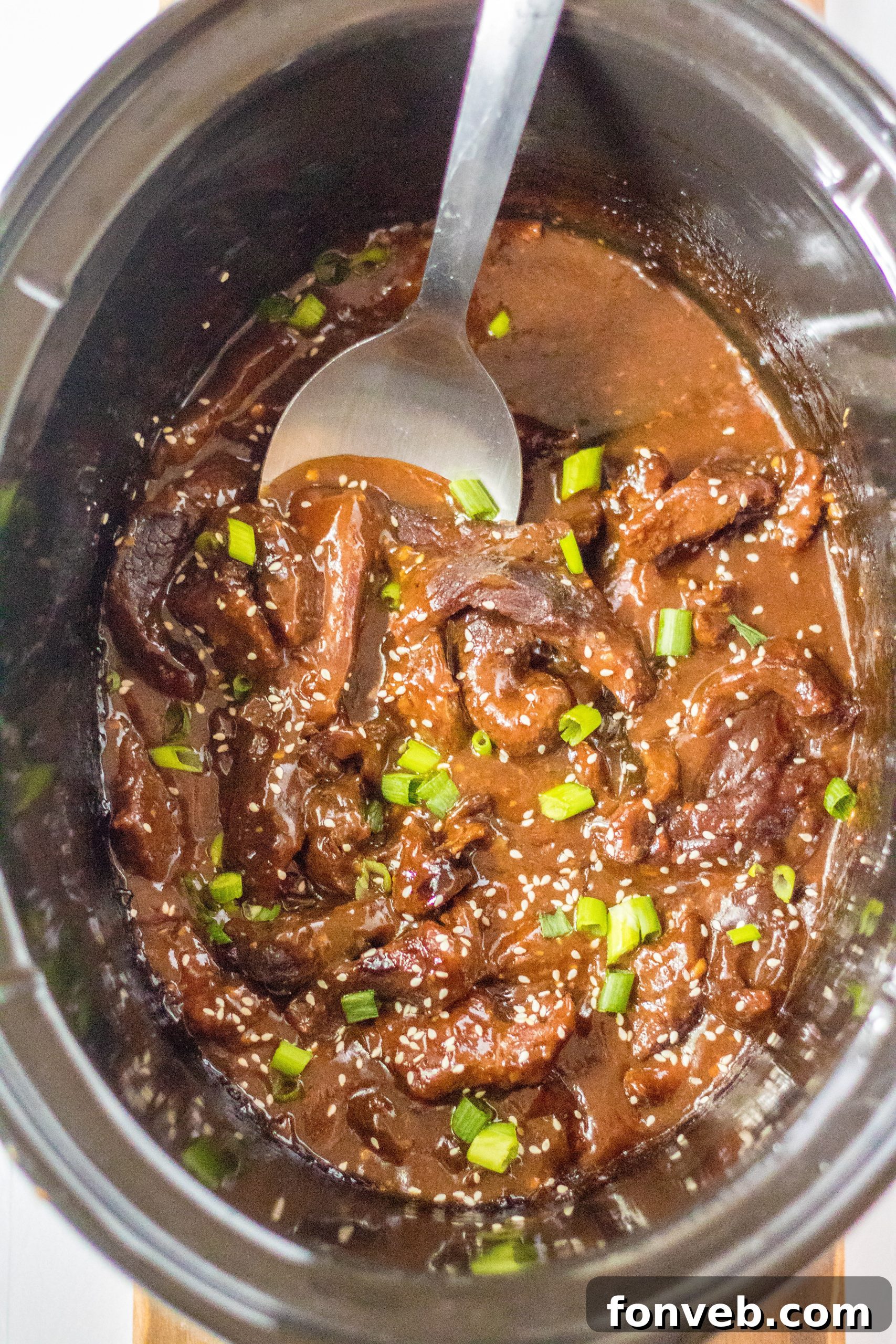 Slow Cooker Mongolian Beef Delight 8 Raw flank steak on a cutting board