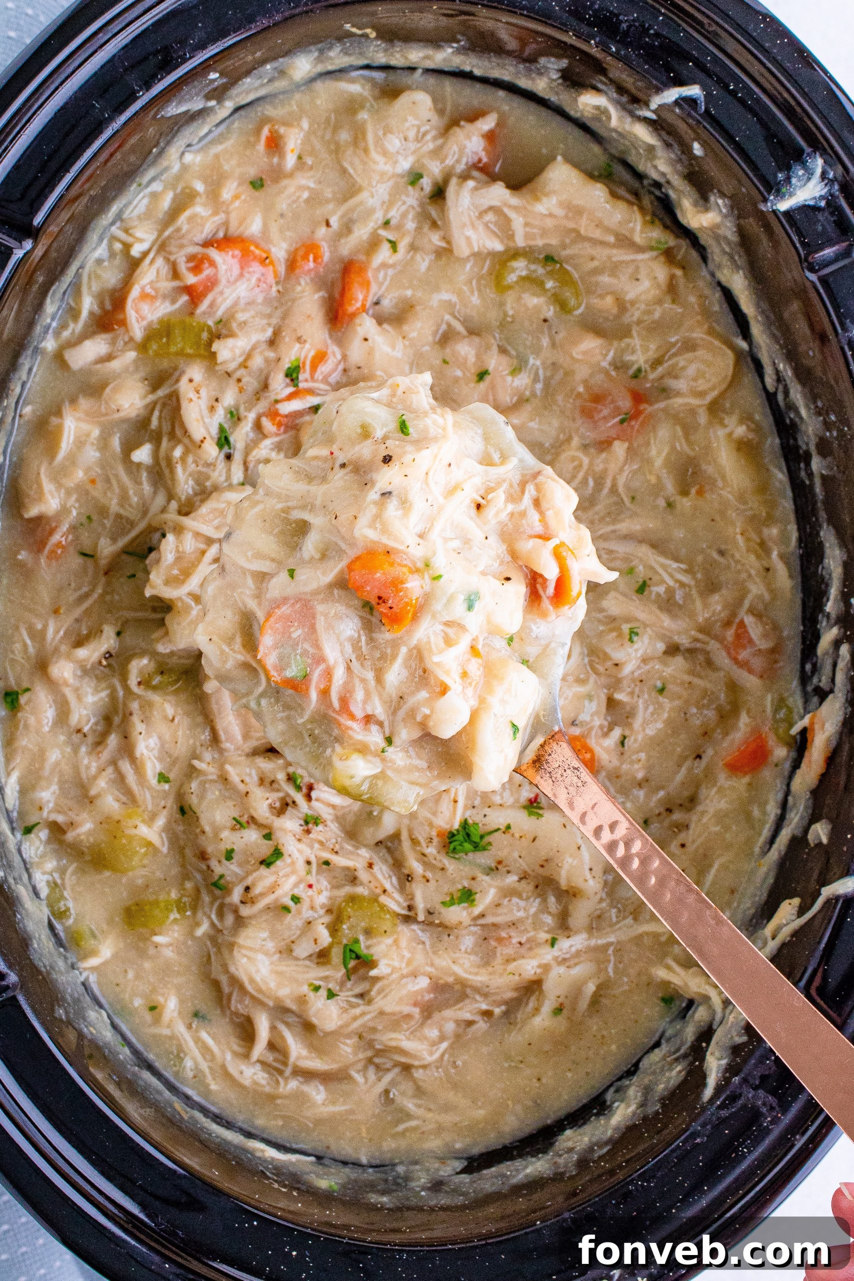 Hearty bowl of Slow Cooker Chicken and Dumplings, perfect for a comforting family meal