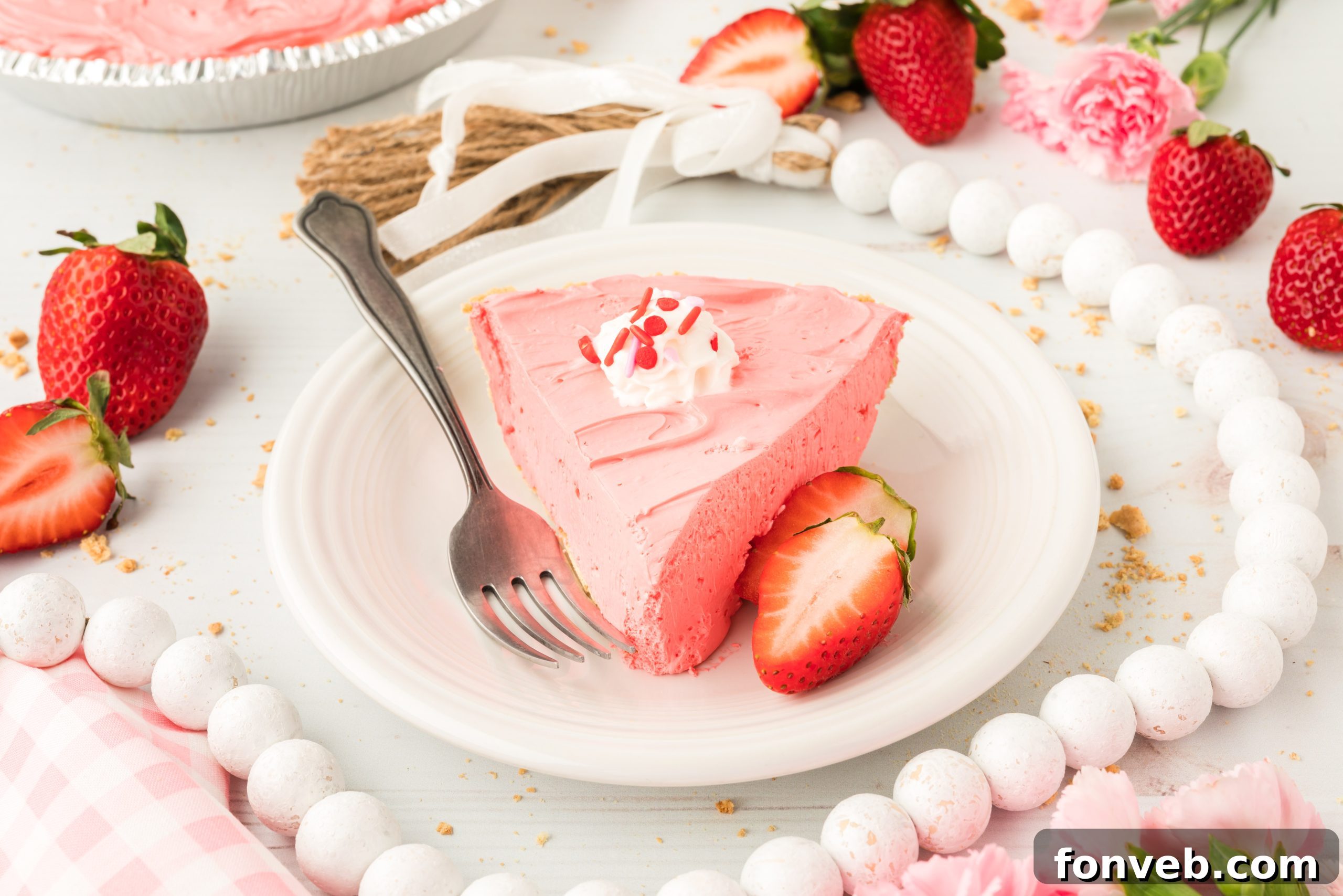 A beautifully set Strawberry Kool-Aid Pie, ready to be served.