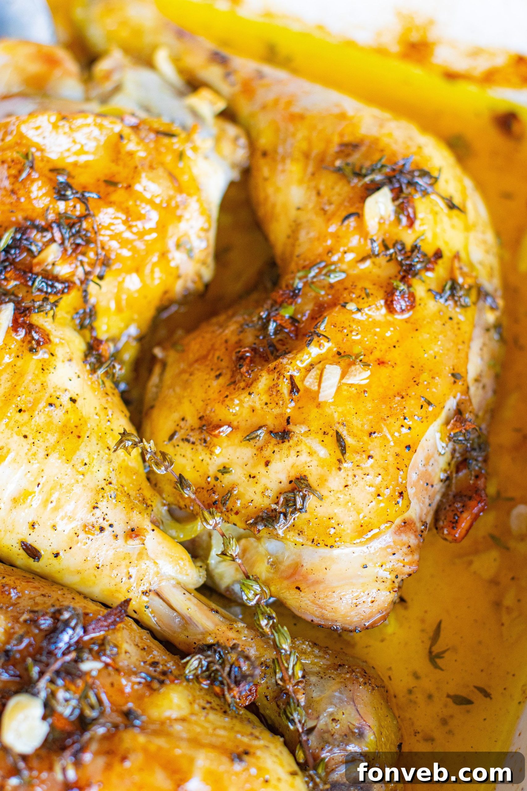 Platter of freshly baked garlic butter chicken thighs, ready to be served.
